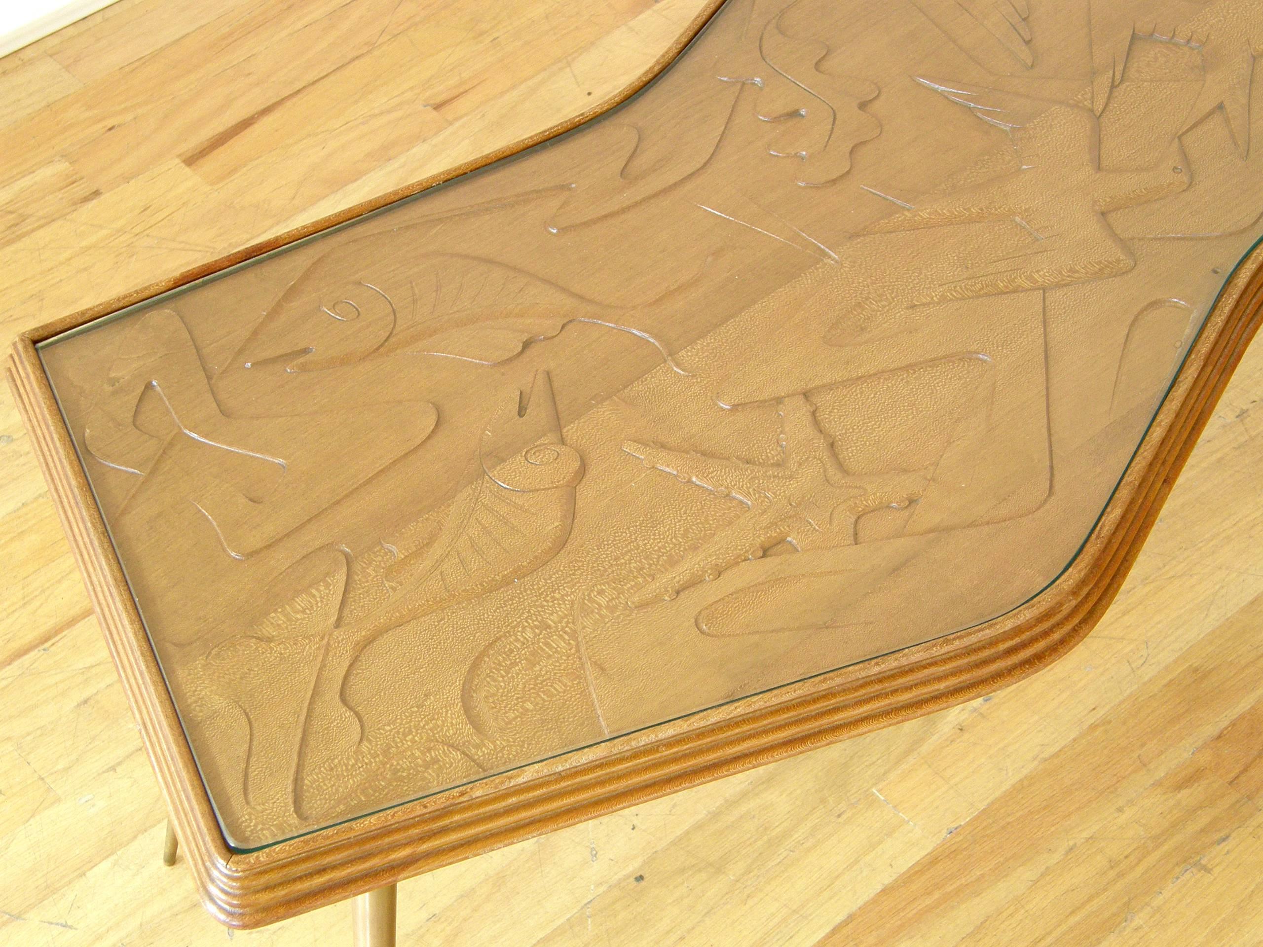 Mid-20th Century Sculptural Mahogany Coffee Table with Brass Legs and Carved Birds and Fish For Sale