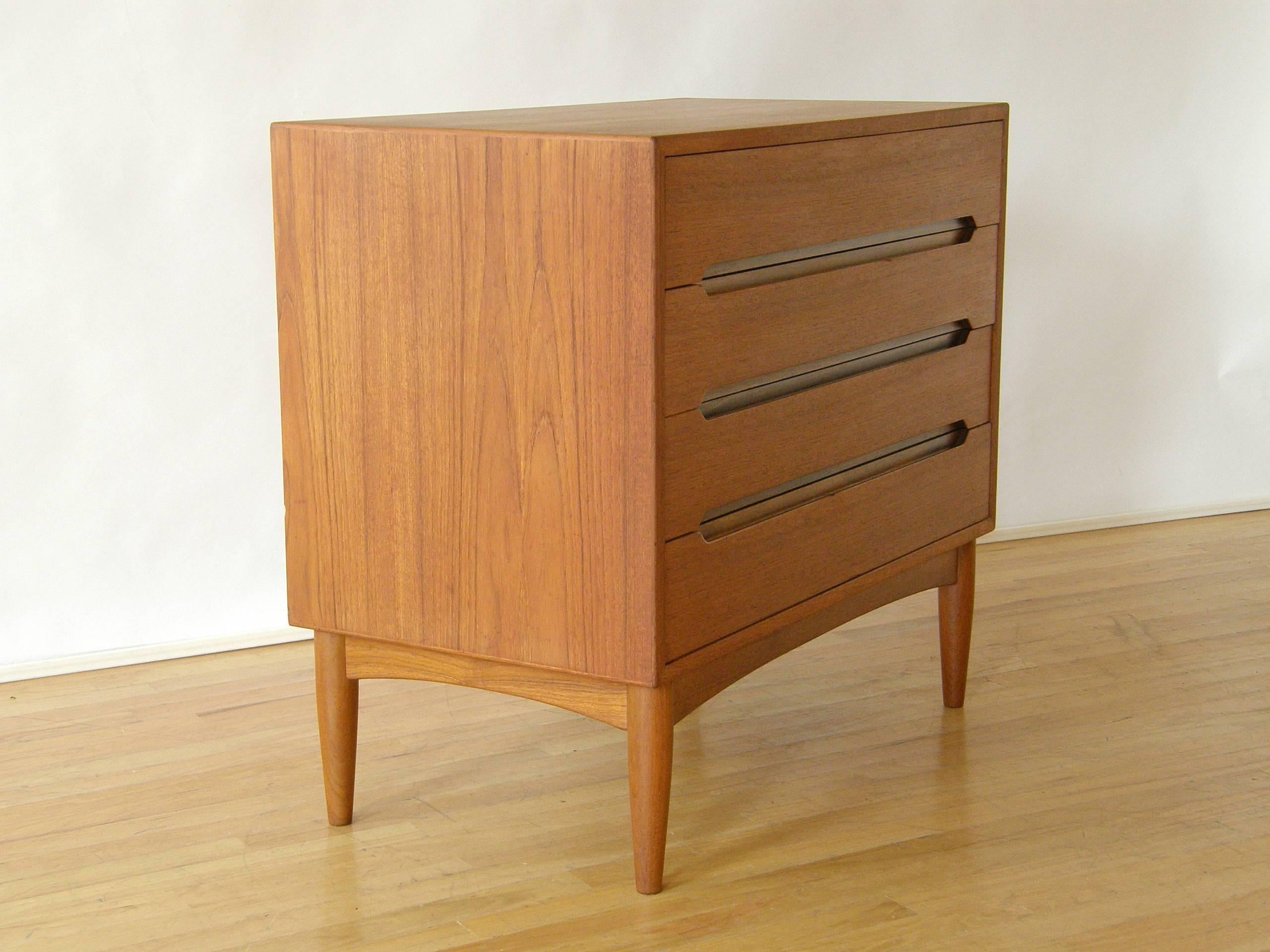 Teak, four drawer dresser with recessed pulls designed by Arne Wahl Iversen for Vinde Møbelfabrik, Denmark.

Please contact us if you have any questions.