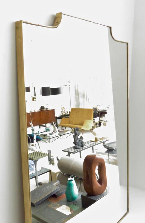 Large Vintage Italian Brass Mirror with Sculpted Top at 1stDibs