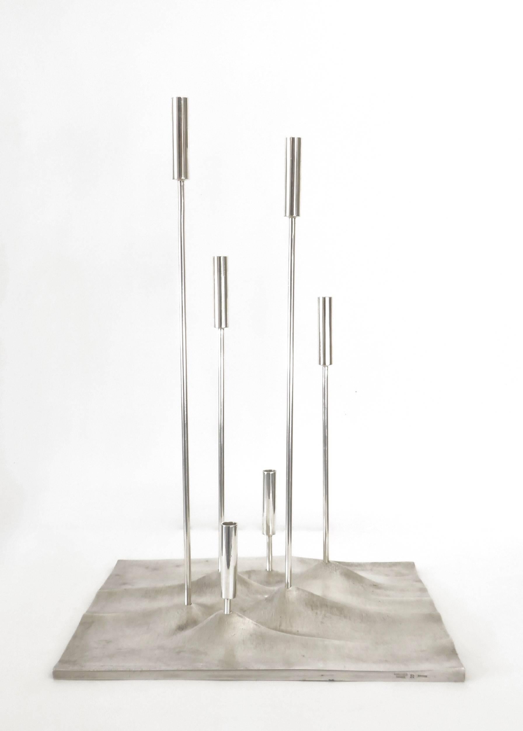 Designed in 1959 by the finnish designer Tapio Wirkkala, this candleholder was made by Christofle France.
Tapio Wirkkala designed this Candelabrum, 
