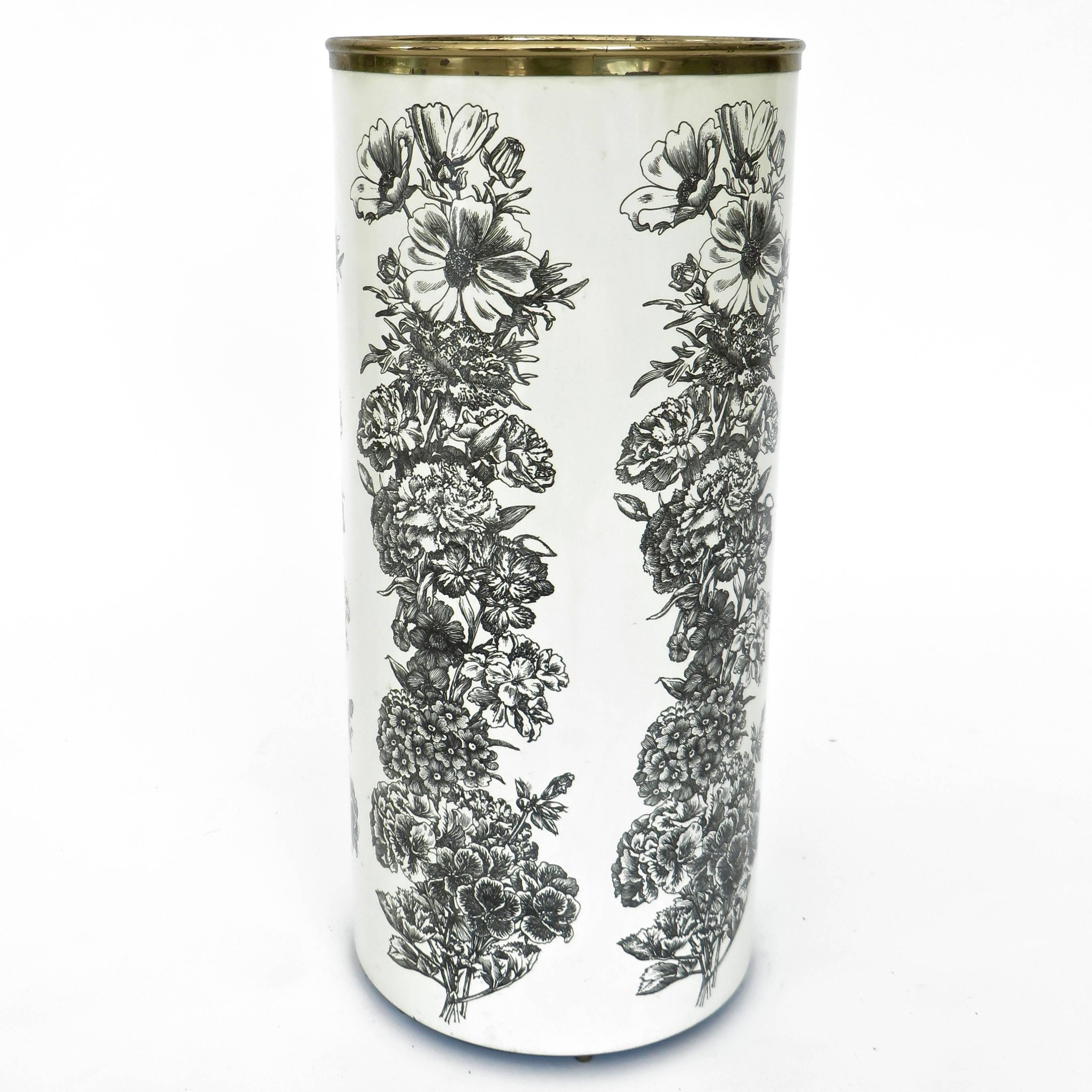 Italian metal black lithographed floral motif on white background umbrella holder stand by Piero Fornasetti.
Brass rim.
Label intact on bottom.

          