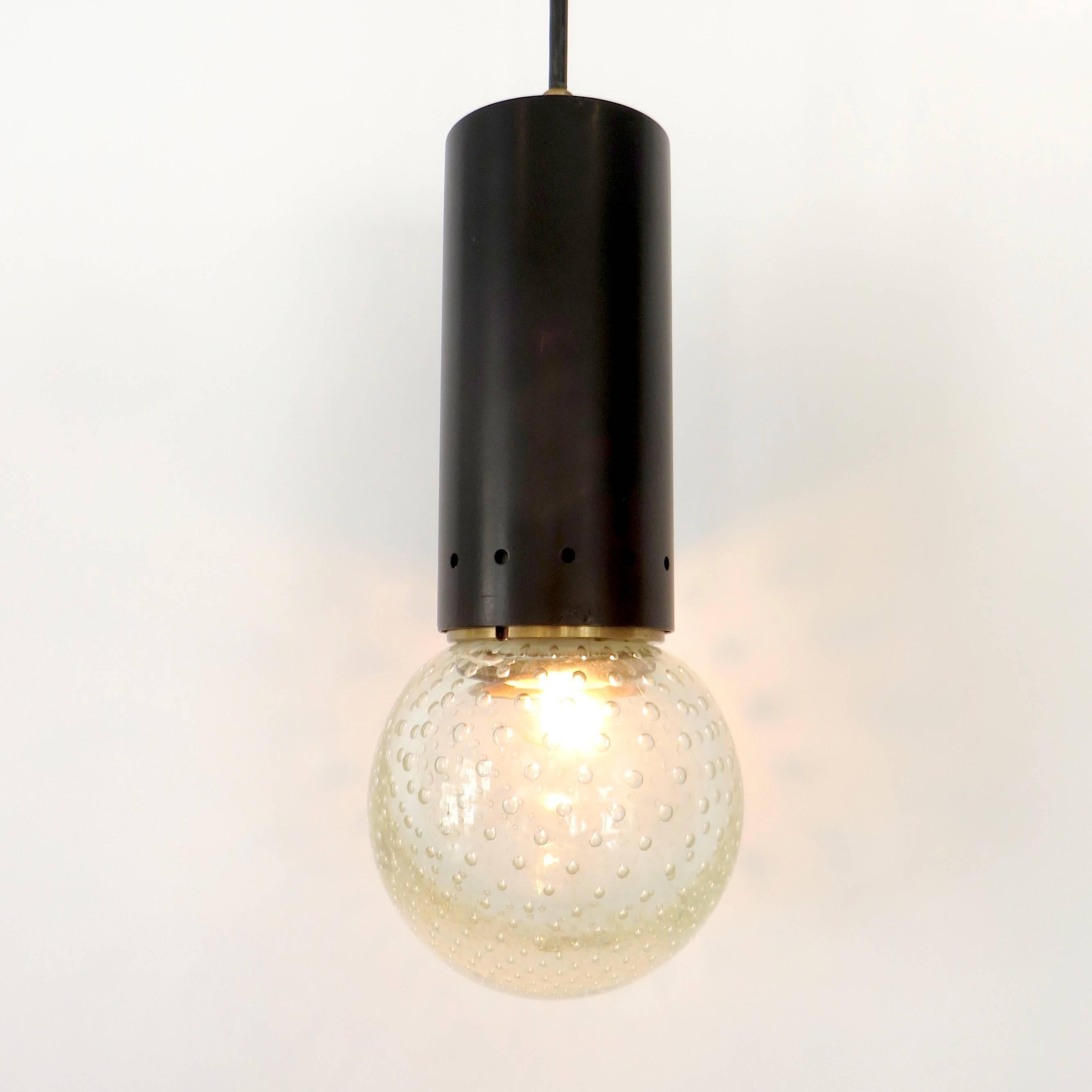A single Murano glass pendant by Gino Sarfatti with Archimede Seguso for Arteluce. 
Perfect condition. The length of the 8ft long black hanging cord can be altered for the location. Black ceiling cap included.
Rewired for USA.
Overall size 4.5