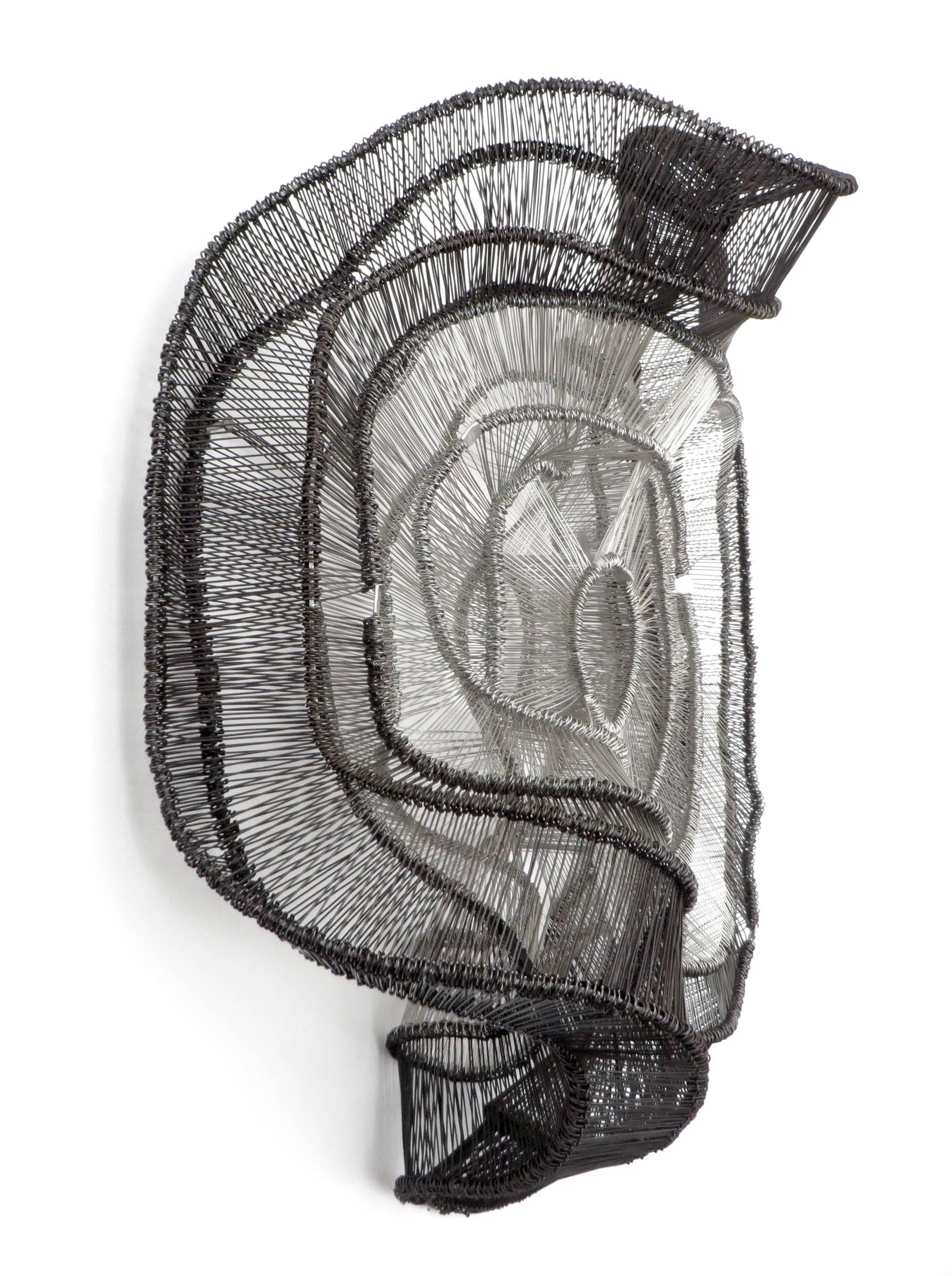 Eric Gushee woven wire metal wall sculpture in an Ombre motif of silver gray and black from the Emergence series. Large undulating metal woven wire that undulates from the wall. From the most recent new work. Available now. 
Eric Gushee is an artist