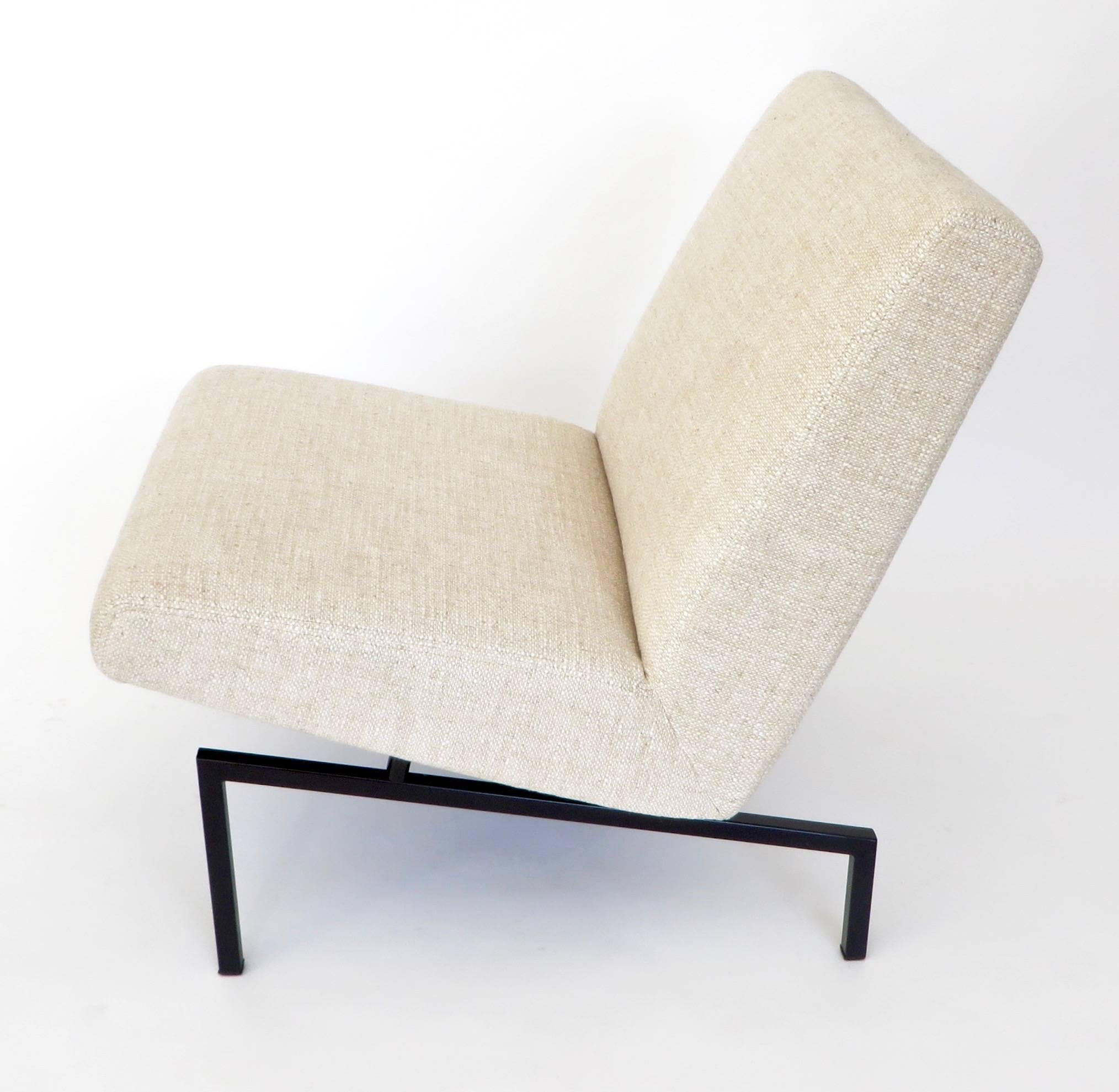 Minimalist, with elegant proportion, the tempo lounge chairs were designed by Joseph Andre Motte and editioned by Steiner. Metal tag on one chair.
Restored cushions and completely reupholstered in nubby oatmeal linen.
Measures: Overall size: 22.5