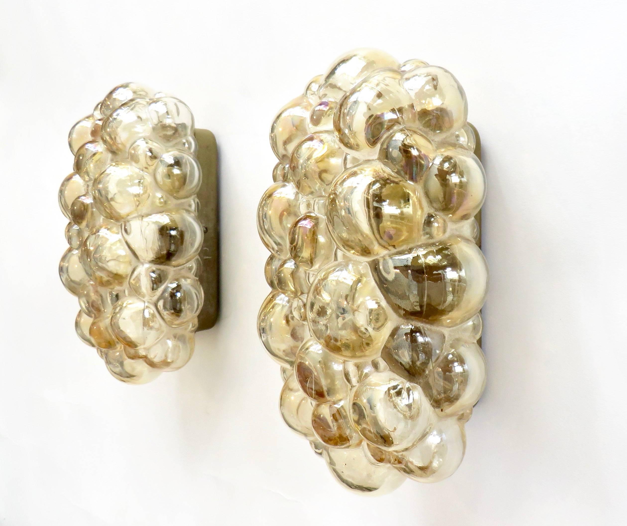 A pair of rectangular bubble moulded glass champagne or light amber color bubble flush mount sconces by Helena Tynell for Limburg Glass. 
No chips or cracks to the glass. 
These have been rewired for USA. E14 bulb in each sconce. 
 