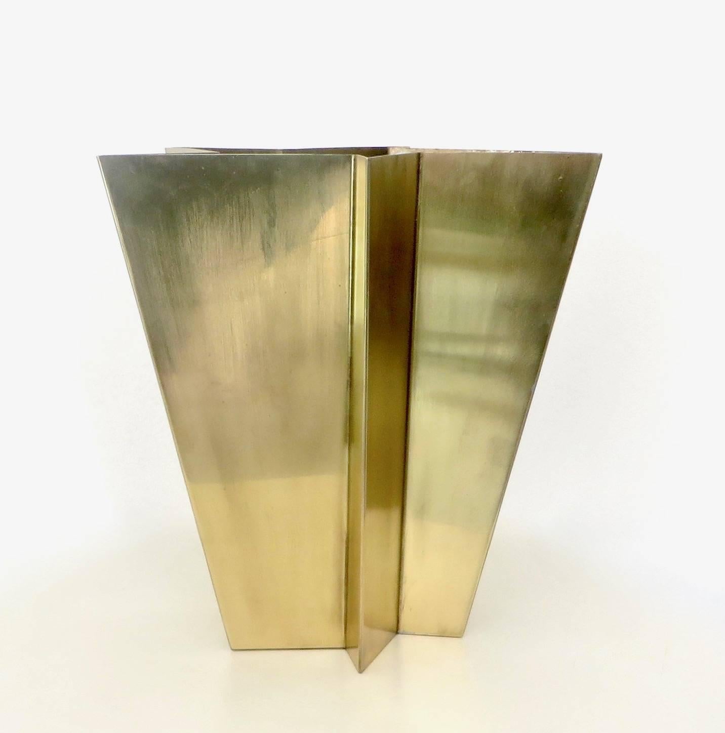 Tommaso Salocchi is a designer in Milan and the son of famed artist, designer and architect Claudio Salocchi. 
This star vase in folded brass was designed by Tommaso Salocchi, and created in 2009 and fewer than 20 were produced. 
They were all