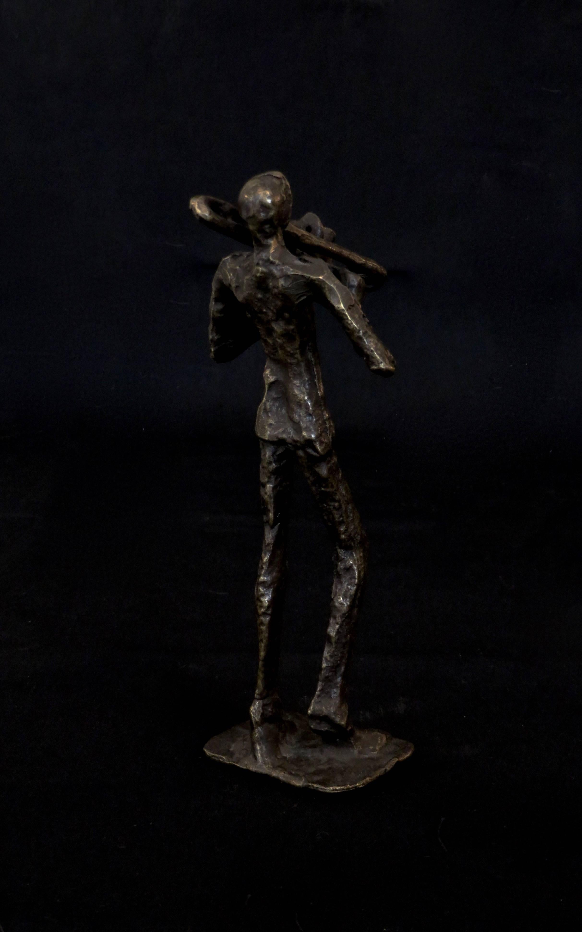 An abstract cast bronze small sculpture of a trombonist. No attribution but perfect for the musician in your life.