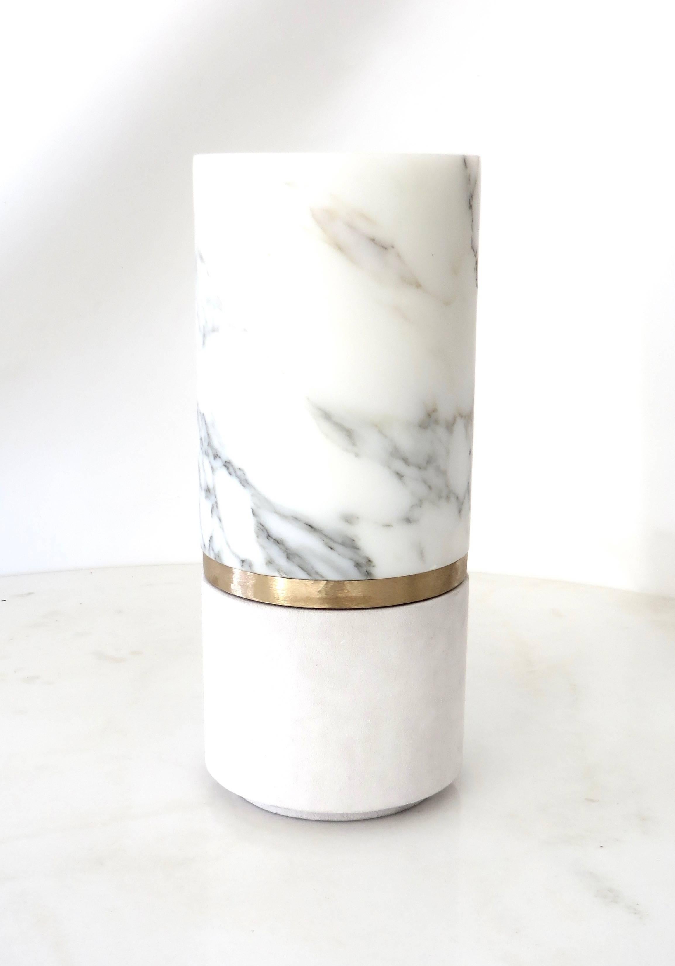 Contemporary Belgian designer Michael Verheyden Dure vase from his home objet collection. 
Each piece of marble is unique. 
Supplied with a glass water proof tube liner for use.
Overall size: 
6