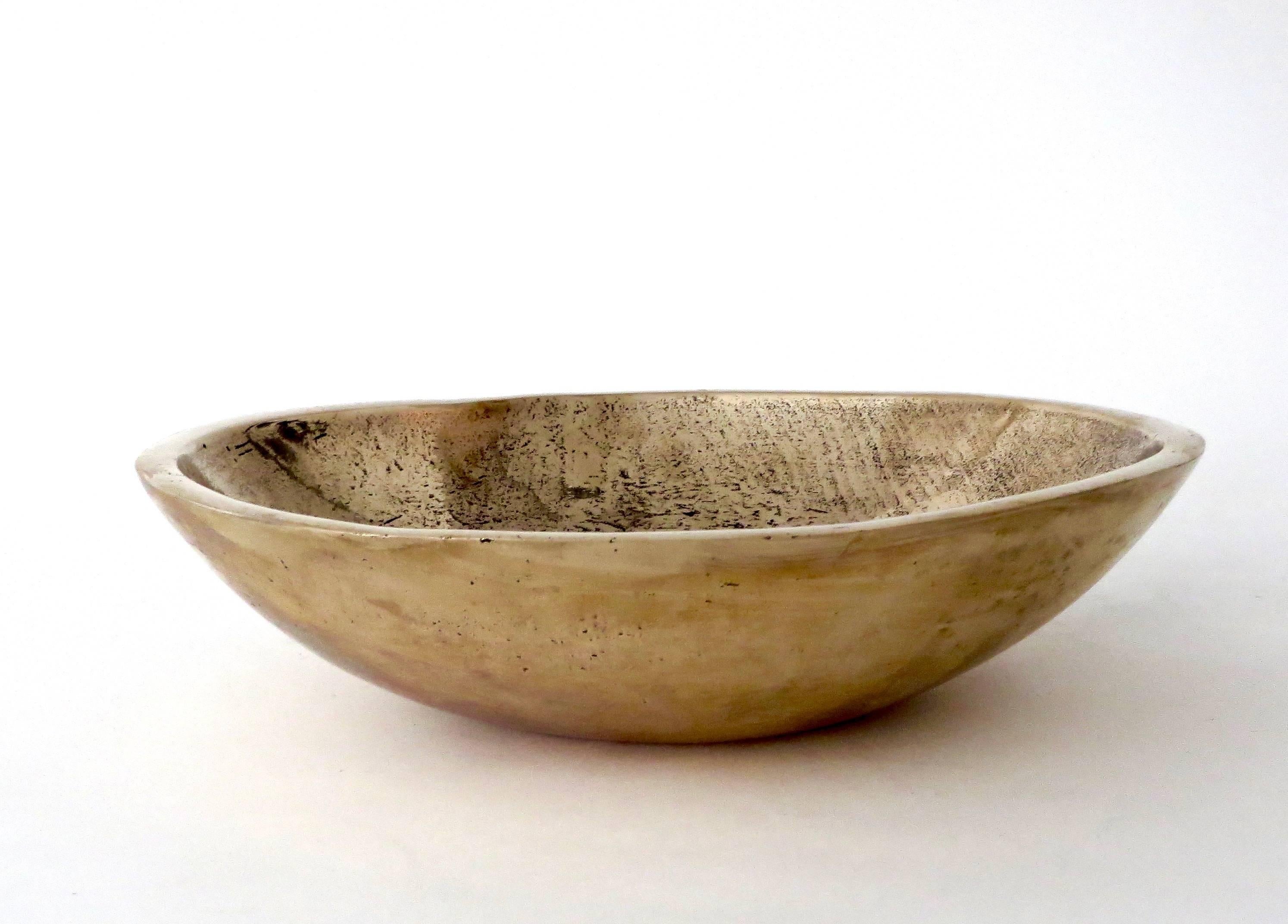 Bronze bowls by contemporary Chicago and Los Angeles based artist Elliot Bergman.
Inspired by the sound of the vessels when lightly rung, Bergman has incorporated them into his band Wilde Belle.
Sound vessels, sound sculptures, bronze.
Each bowl