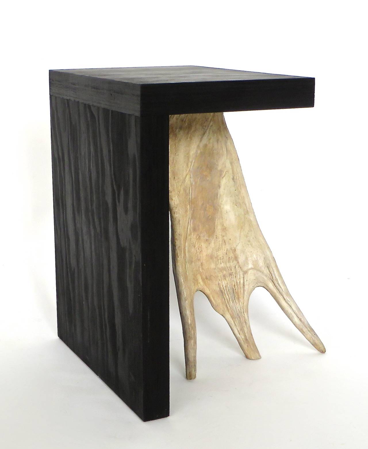 Black ebonized stained solid plywood forms with elk or moose antler.
Iconic Rick Owens use of natural and organic modern materials.
These are from the open edition series. Each stool is signed on the base and is a piece unique. May be used as side