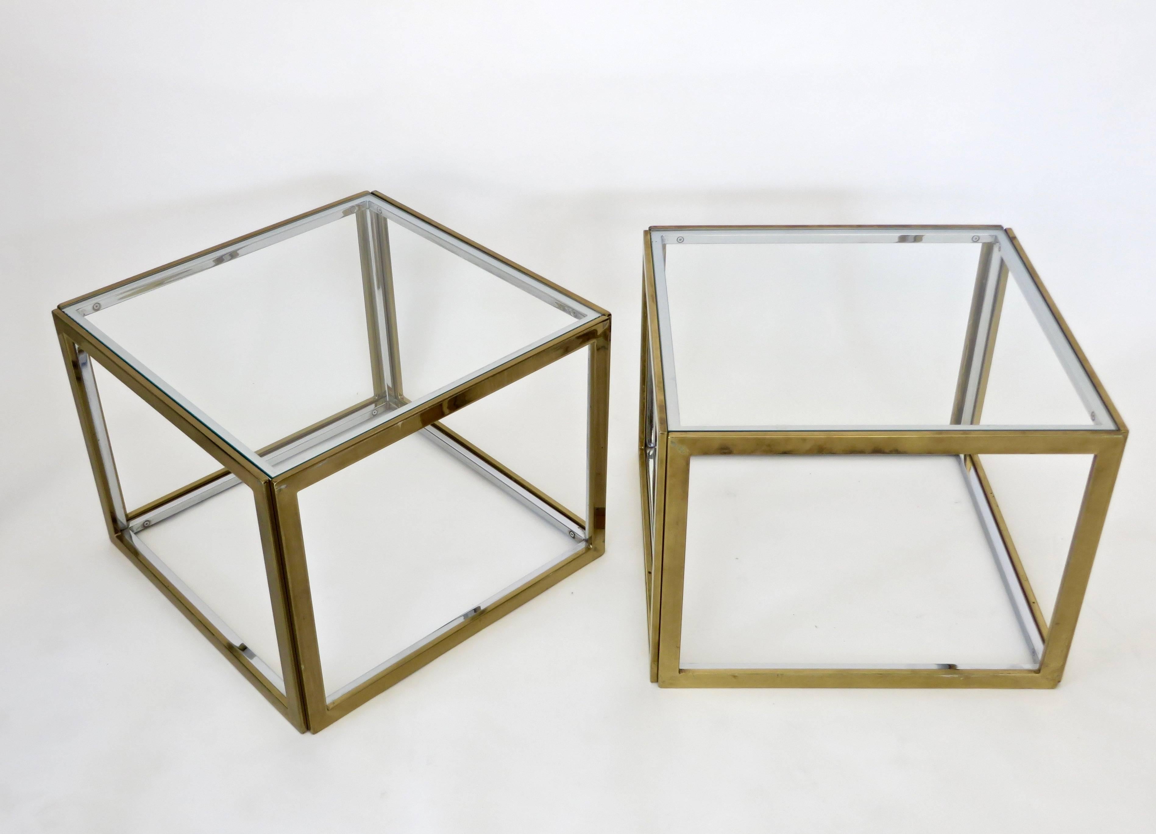 A pair of French square brass and chrome end or side tables with glass top by Maison Charles et Fils. Can easily be put together to use as a coffee table.
This listing is for one pair. 
Each square is 20