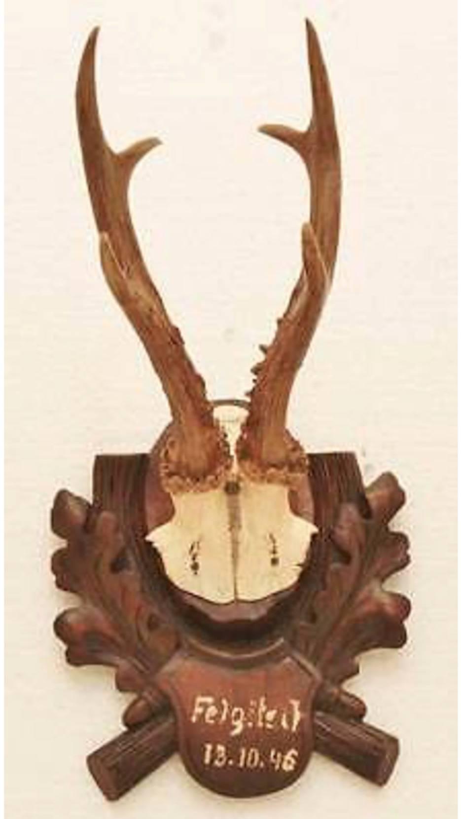 Collection of nine black forest antler mounts on hand-carved wood plaques. Priced per mount.