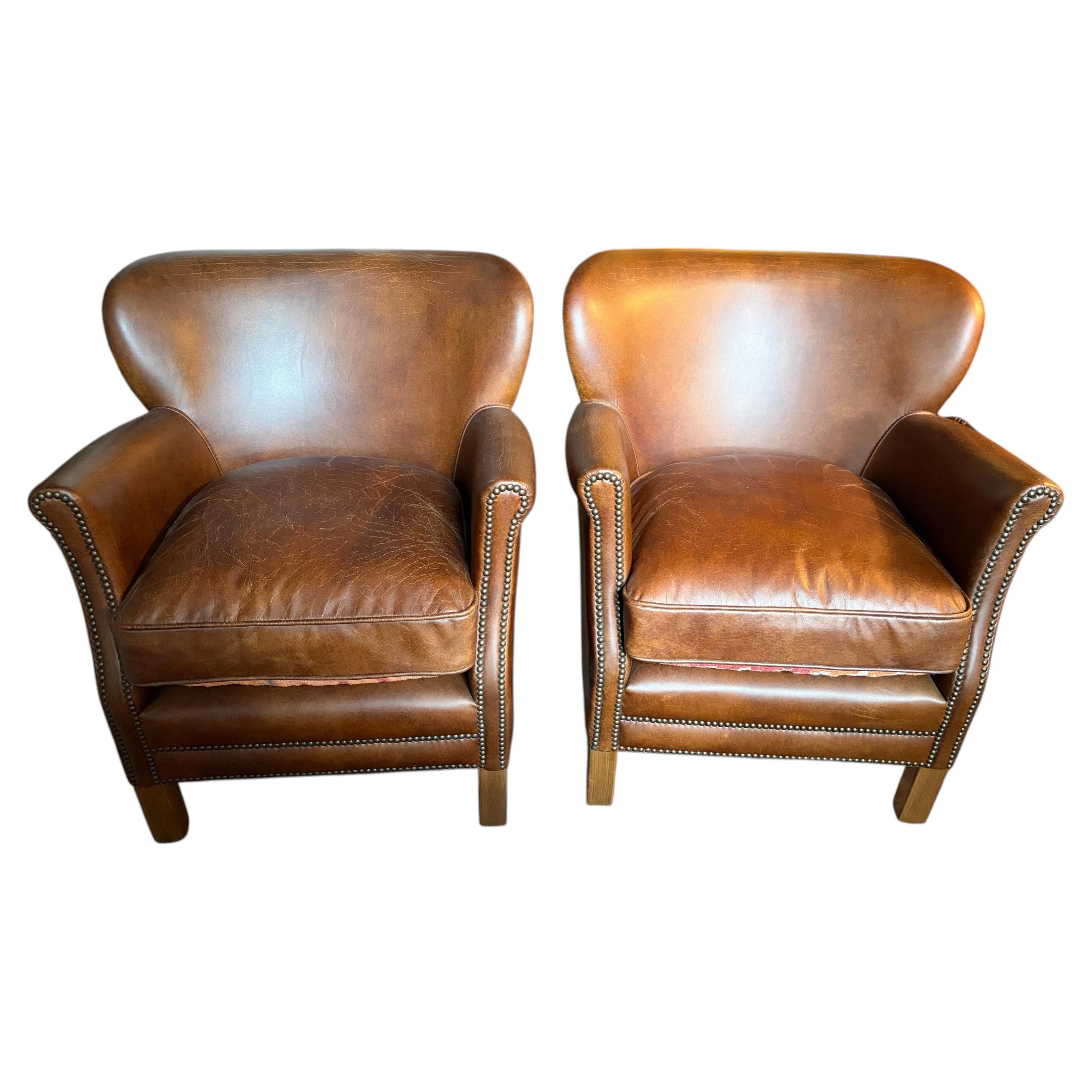 Precioso sillón de club de estilo inglés, de cuero envejecido y con cojín reversible. en venta
