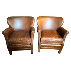 Handsome English Style Club Chair In Distressed Leather And Reversible Cushion.