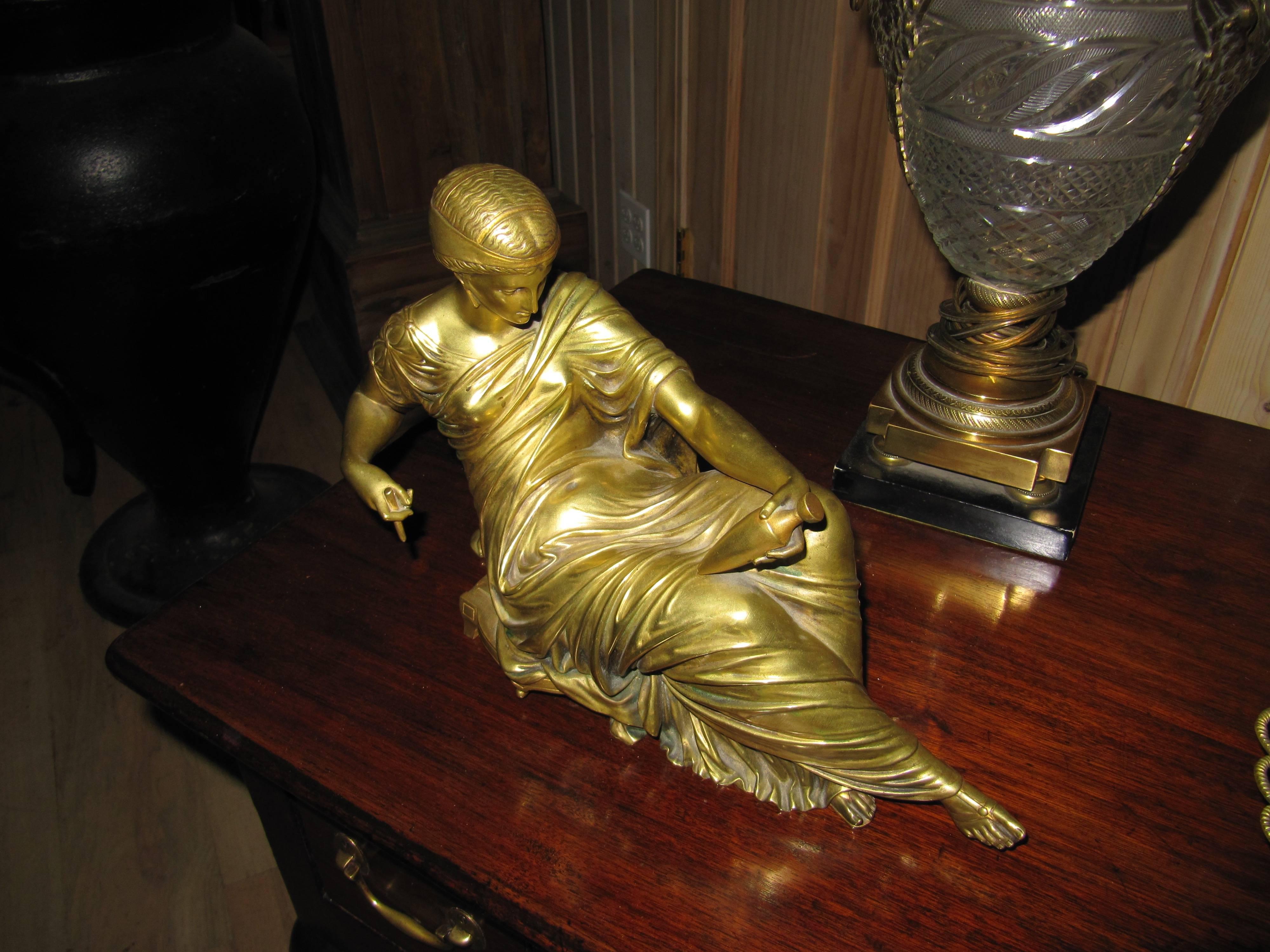 Spectacular gilt bronze of reclining Roman woman, beautiful gilt finish.