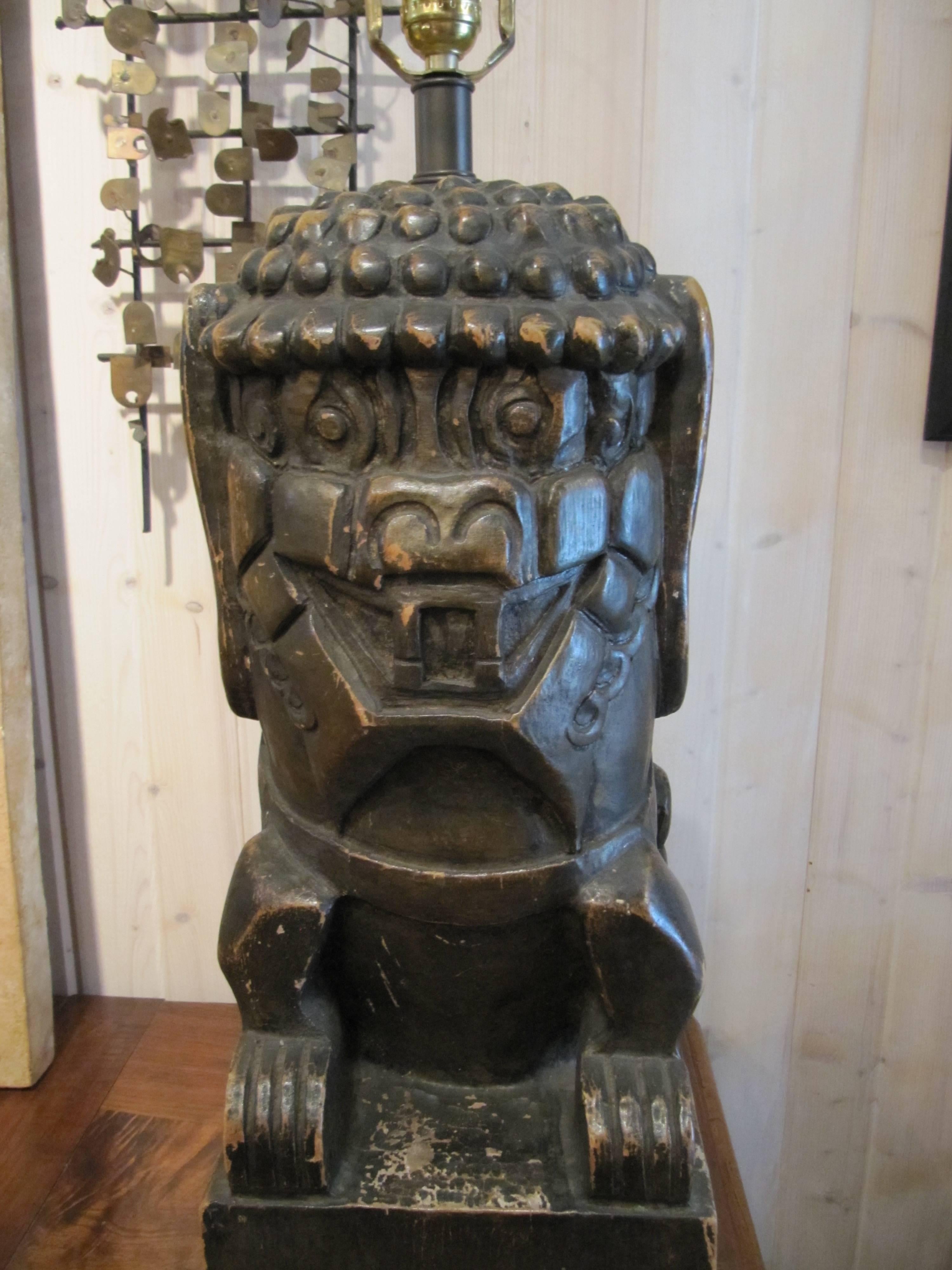 English One Pair of Monumental Carved Wood Foo Dogs Mounted as Lamps For Sale