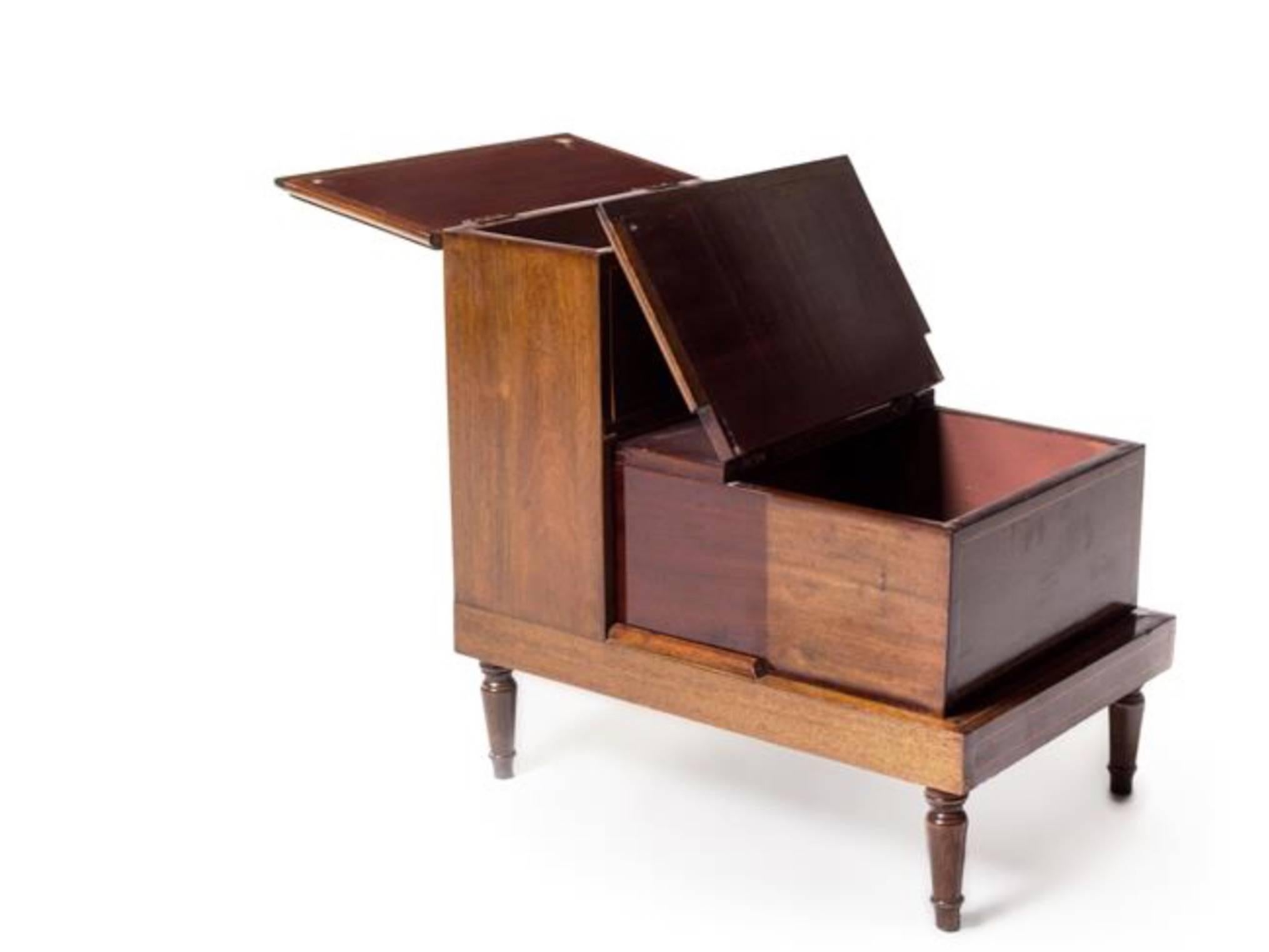 Handsome English Regency style mahogany library or bed steps great as side table. Inset leather top with gilt tooling.  Slide out lift top storage and storage in top step.