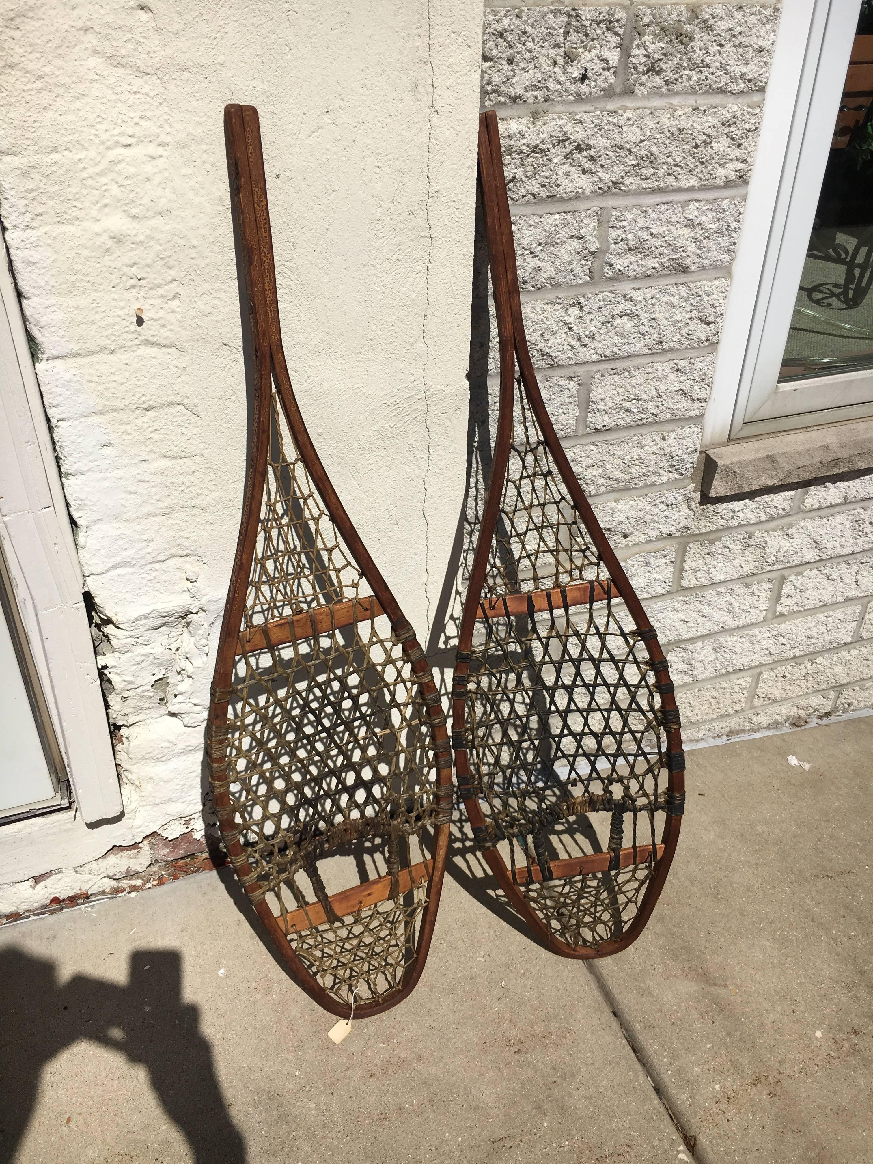 Handsome pair of 19th century snow shoes, great as wall sculpture.