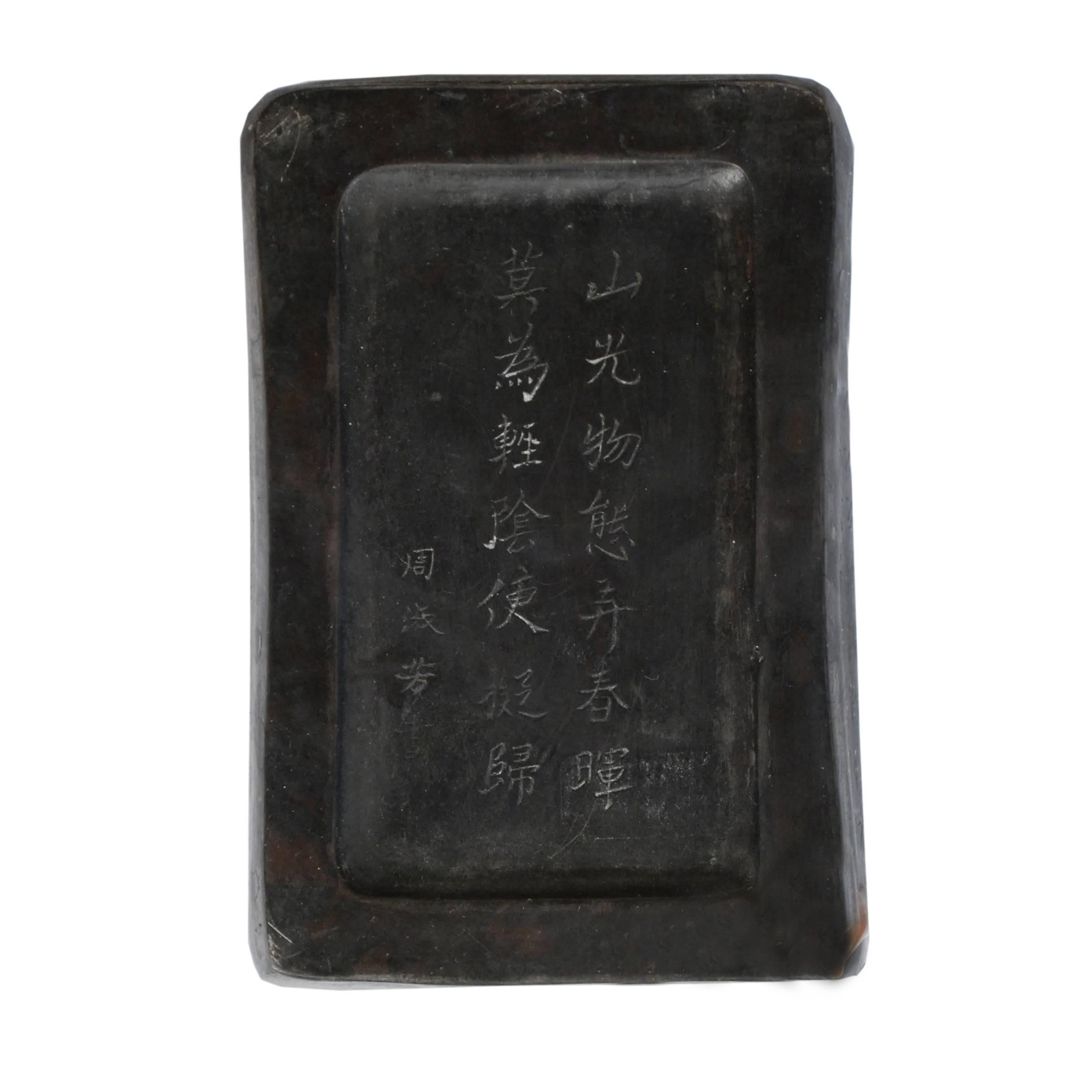Inkstones were used by a venerable scholar or artist to saturate calligraphy brushes with ink. This 19th century inkstone is finely carved with a Qilin, a mythical Chinese beast associated with sages and considered an omen of prosperity. It was