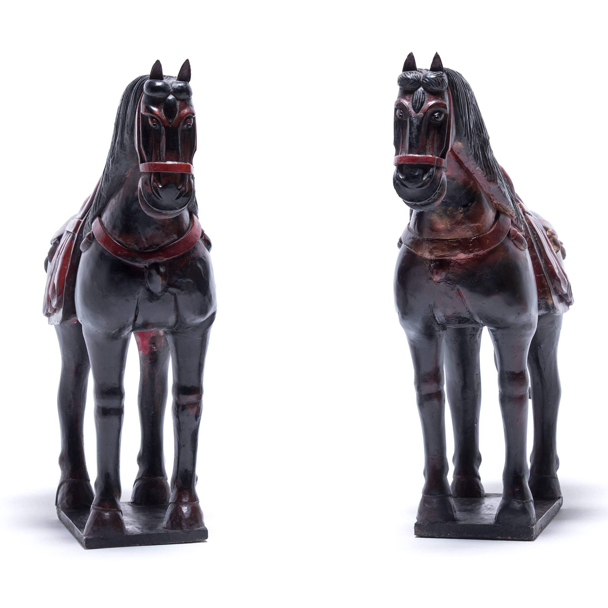This handsome pair of lacquerware horses was made over a century ago in China’s Fujian province. For thousands of years, horses have been one of the most popular animals in Chinese art and were equated with virtue and talent. In ancient times the