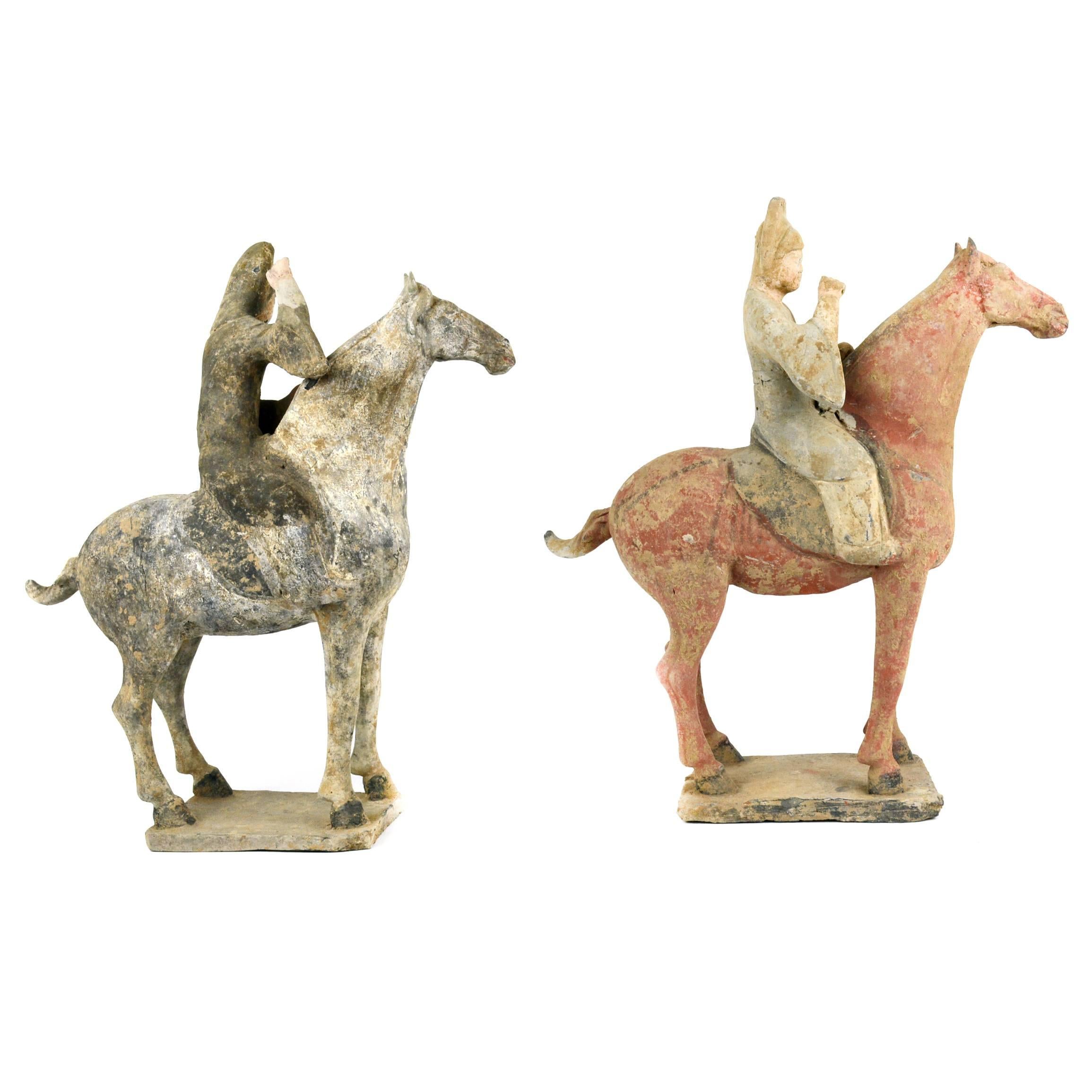 This beautifully sculpted pair of unglazed pottery equestrians was made over 1,100 years ago during China’s illustrious Tang Dynasty (618–906 AD). Each horse stands with their legs firmly planted on the base, while the mounted riders play their