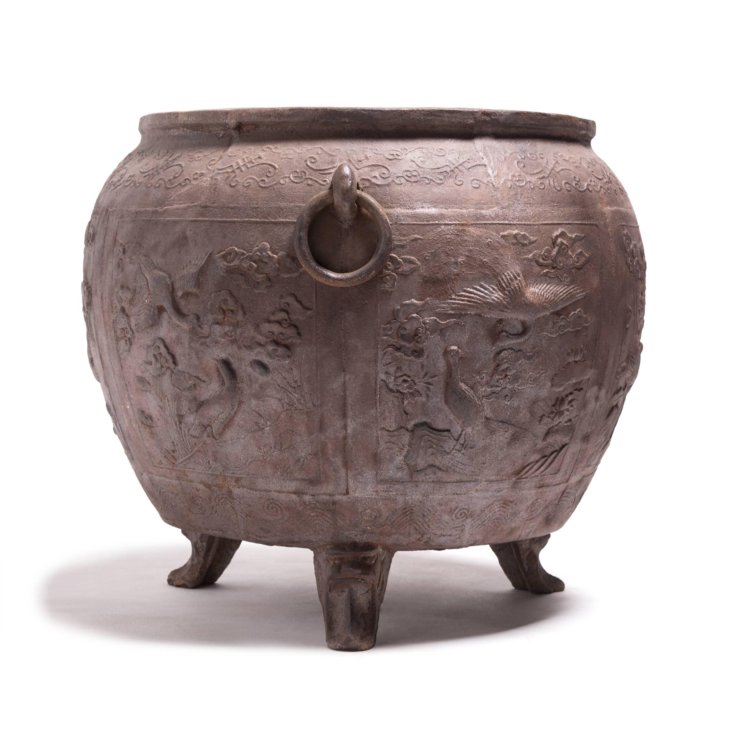 China was the earliest known civilization to make cast iron. It first appeared thousands of years ago during the illustrious Zhou Dynasty. This cast iron vessel is more recent, but the quality and form were inspired by these ancient techniques