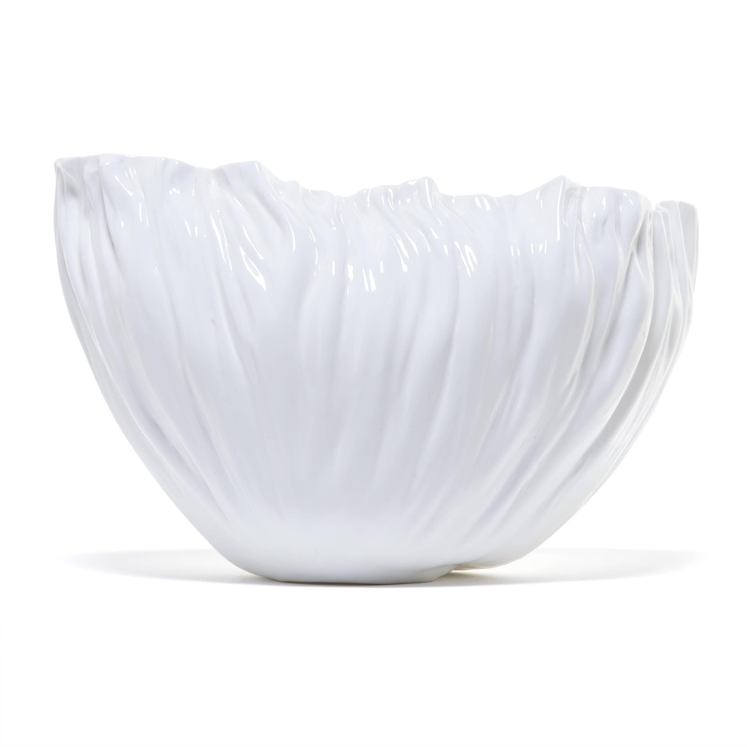 Tapping into a tradition of creating exceptionally Fine porcelain that dates back to the 9th century A.D., Chinese artist Xie Dong has earned international acclaim for her captivating porcelain designs. Intrigued by all that is formless or ephemeral