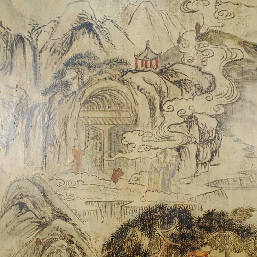 This landscape was painted on northern elmwood over a century ago. The artist referenced the feel and technique of ancient Chinese landscape paintings in his own whimsical way. The scene has a spirited feel, through its craggy mountain peaks, banks