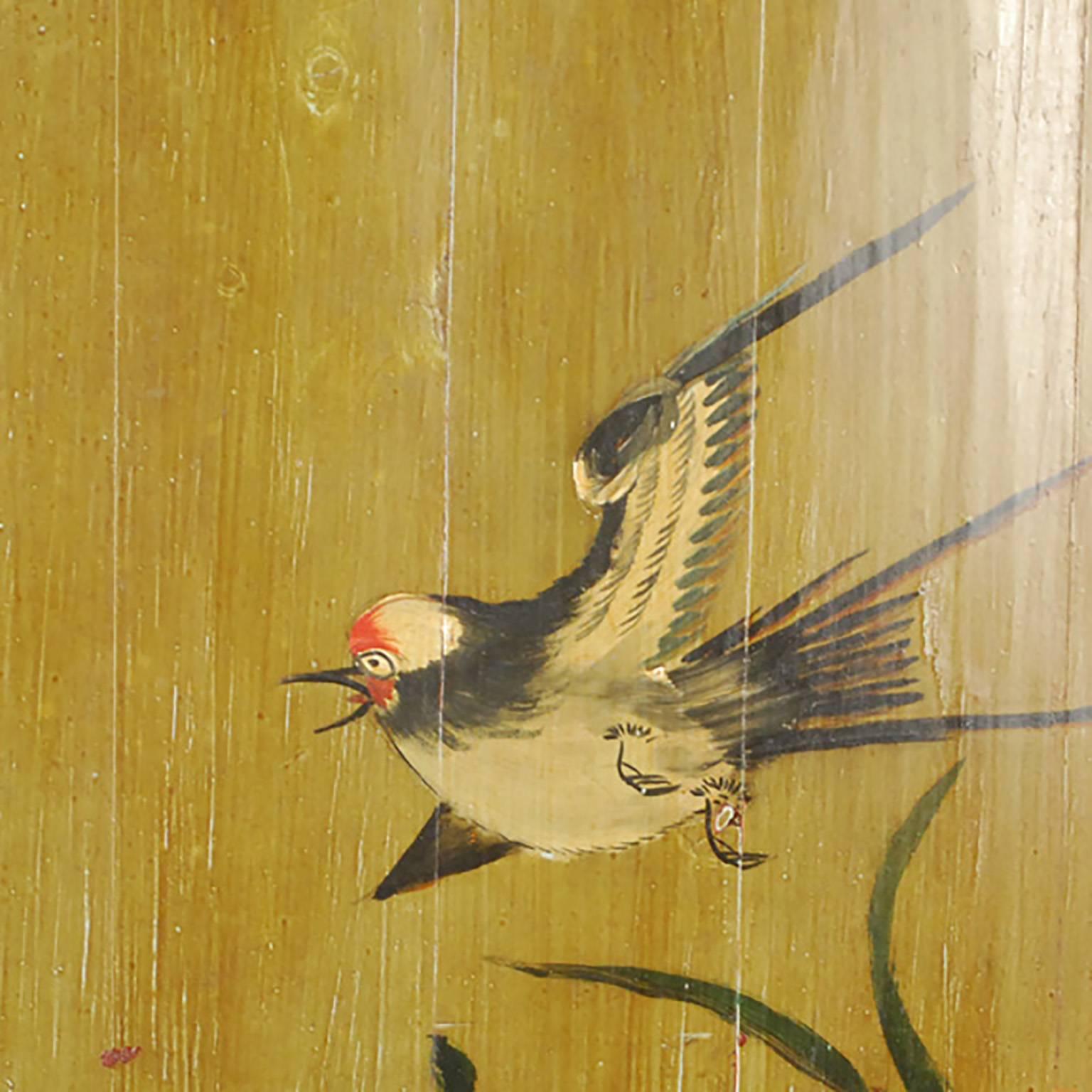 This exquisitely painted panel, painted around 1900 in the port city of Canton (today called Guangzhou), was inset into the sides of an enclosed canopy bed. Painted on natural pinewood, the image is of a swallow among showy chrysanthemums and tiny