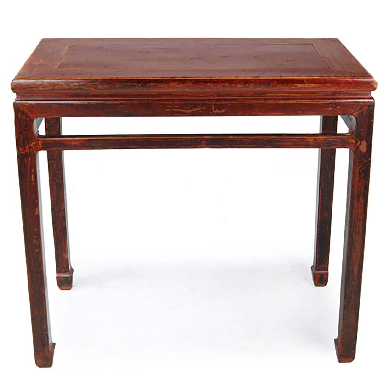 This Qing dynasty wine table is a fundamental example of essentialist Chinese antique furniture-making. In its original home, the table would have provided a serving and display space for its owners. Solid construction and minimal ornamentation