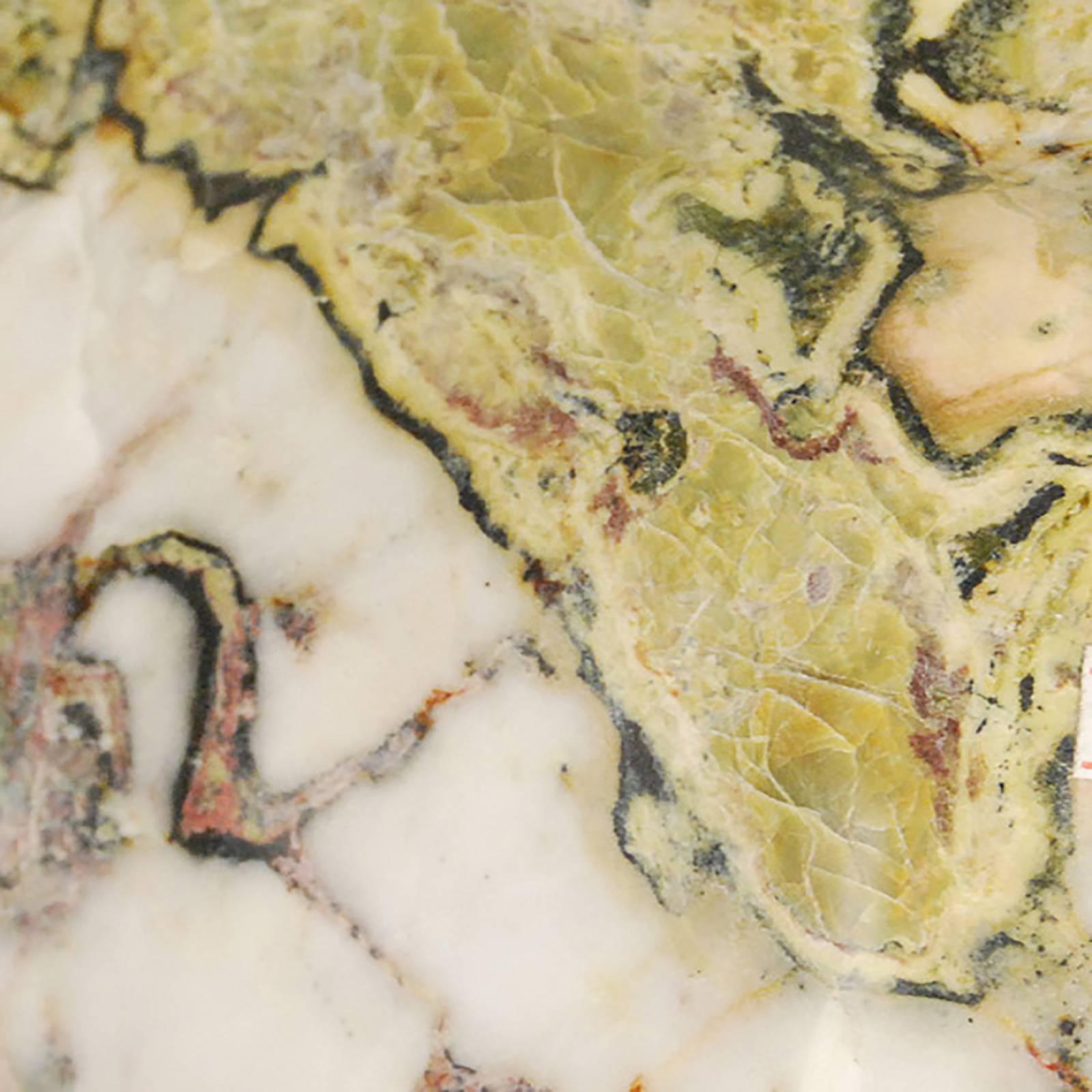 Created hundreds of millions of years ago, this colorful stone foraged in Inner Mongolia has beautiful veining and mottled colors that promote contemplation. A well-chosen stone is a focal point of both a traditional Chinese garden and a scholar's