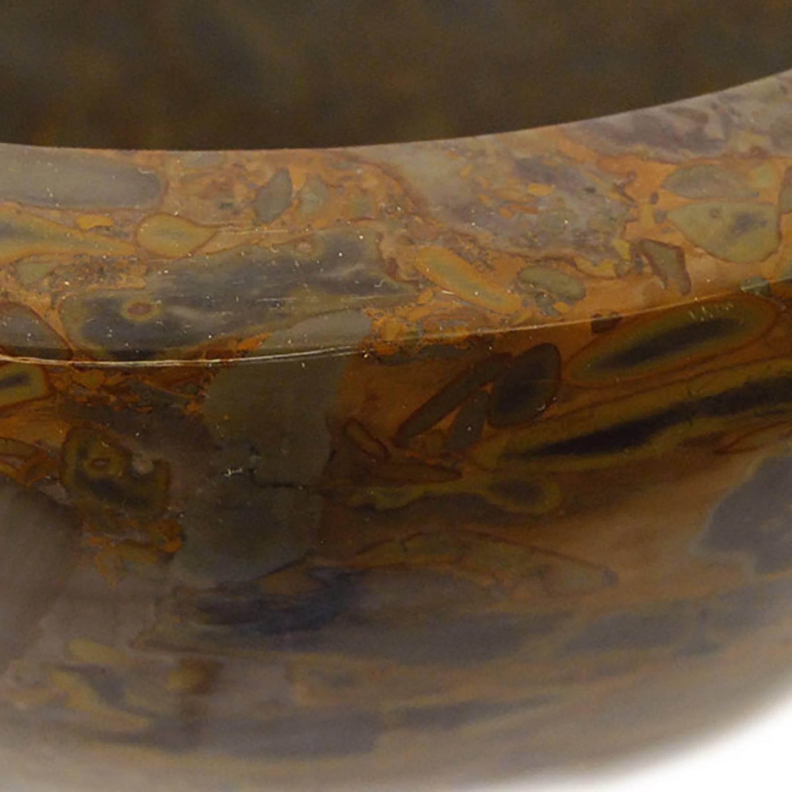 This highly polished stone basin is a rich blend of texture and color. It was carved by hand from a single chunk of pudding stone native to the Jiangsu region of China. Chinese scholars have appreciated pudding stone for centuries, it's natural