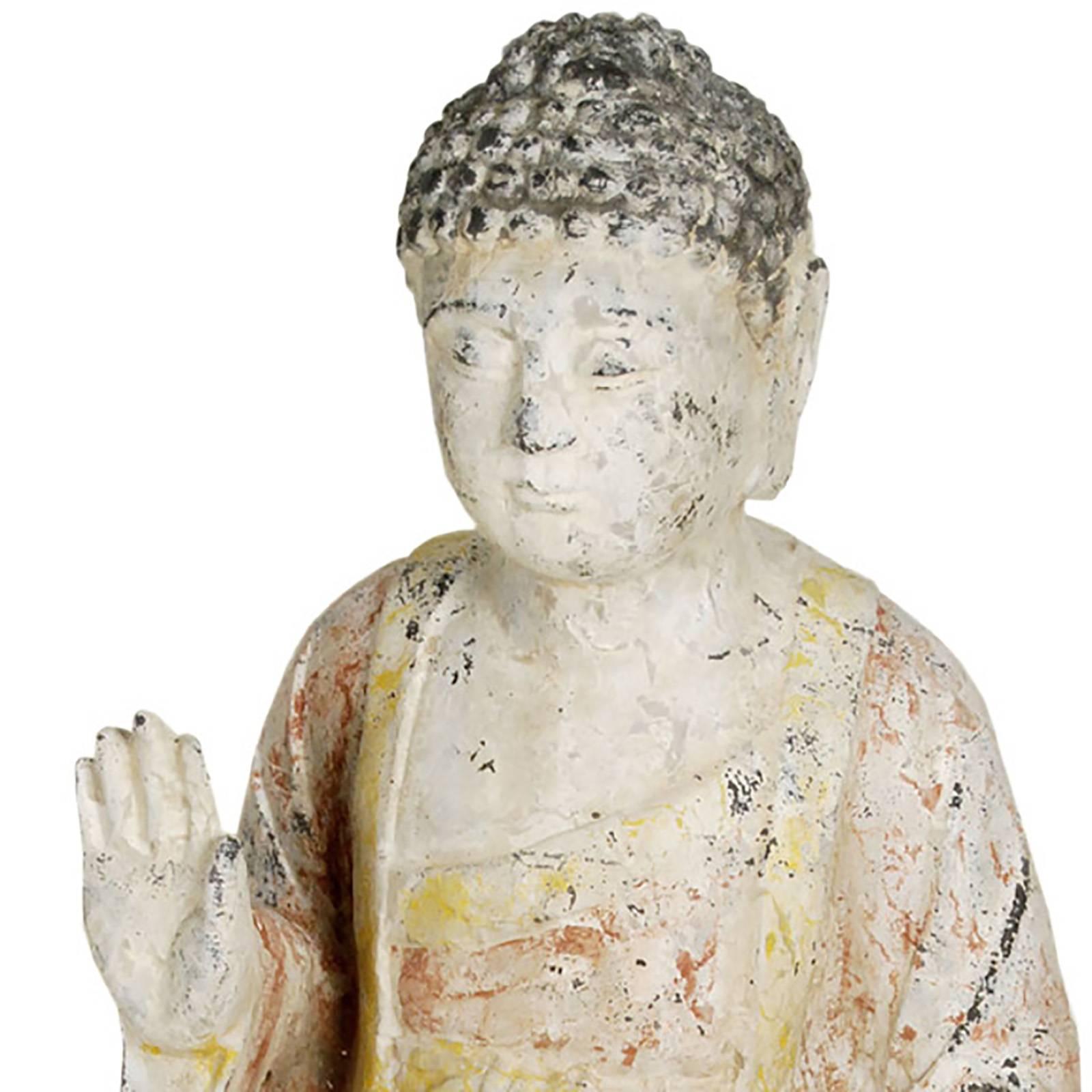 Shakyamuni, or just “Buddha,” is the original Buddhist sage from whom all Buddhist teachings and traditions were born. Shakymuni is easily recognized by his head of tight curls. This seated Shakyamuni is carved from a single piece of stone. He has