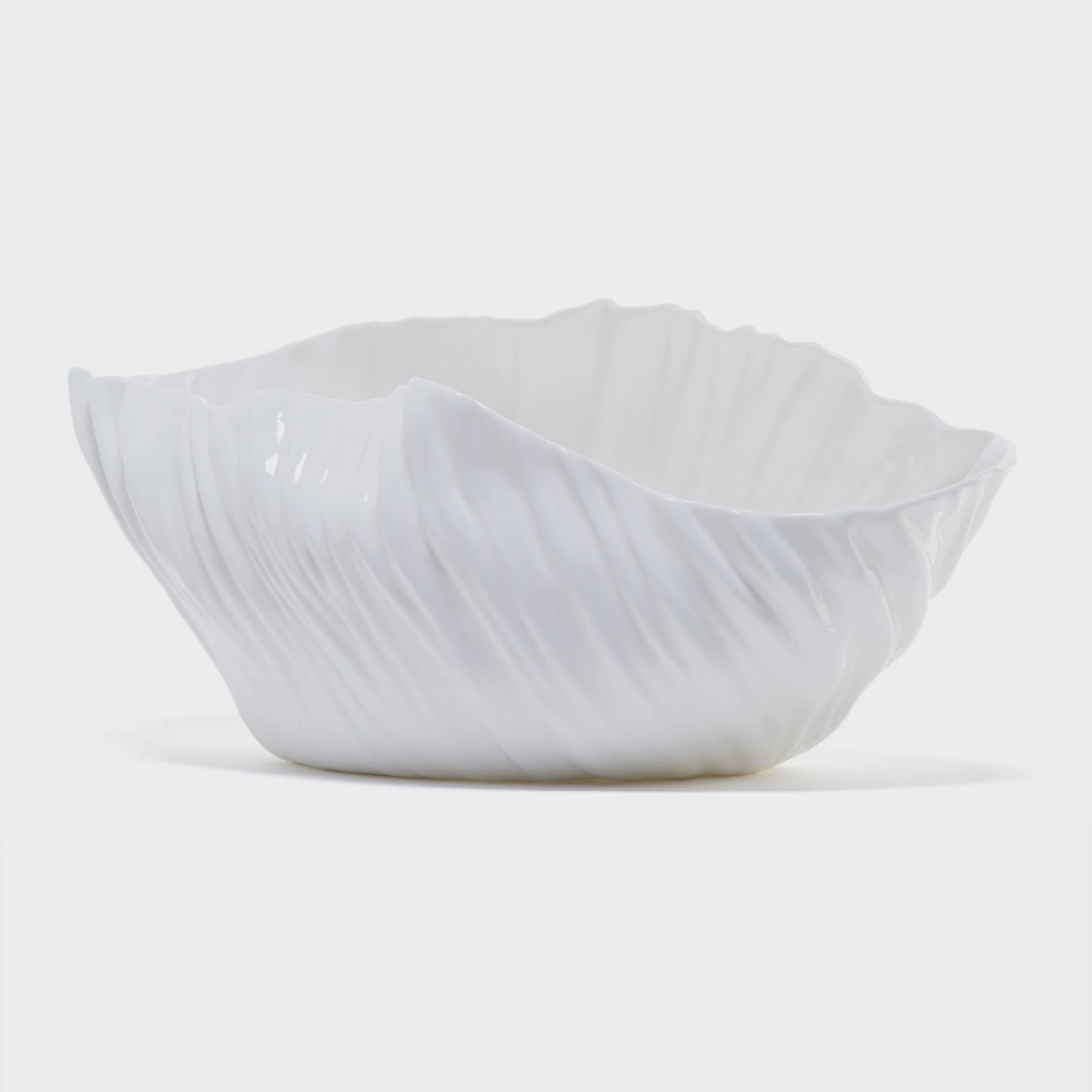 Tapping into a tradition of creating exceptionally Fine porcelain that dates back to the 9th century A.D., Chinese artist Xie Dong has earned international acclaim for her captivating porcelain designs. Intrigued by all that is formless or ephemeral