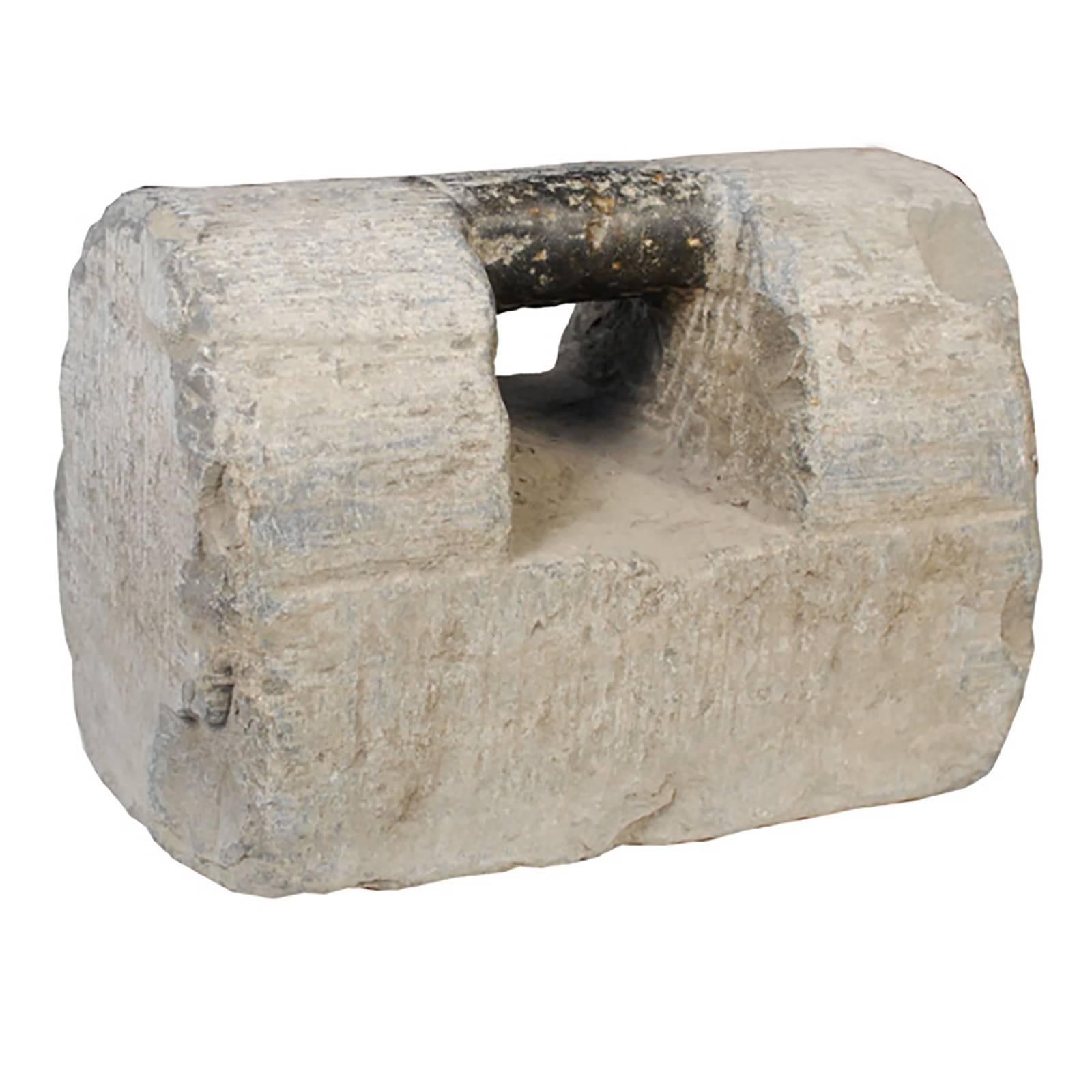 This curious 19th century hand-carved limestone sculptural object was originally used by Chinese martial artists as an exercise weight. The form reads modern and the beautifully worn handle shows hundreds of years of use.

 