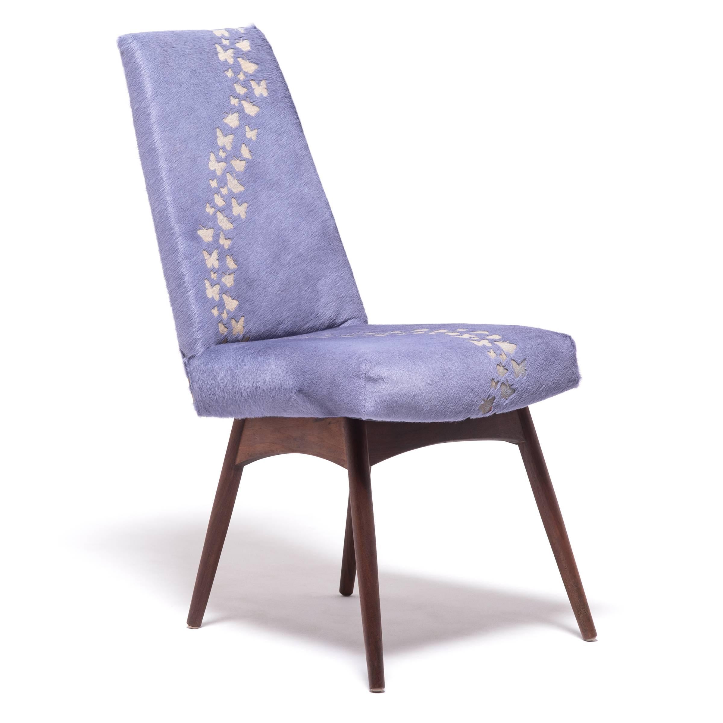 American designer Adrian Pearsall is renowned for his trademark “Atomic Age” look that made his furniture all the rage in the 1950s and 1960s, and a sought-after collectible today. We took the chair in a new direction and reupholstered it in