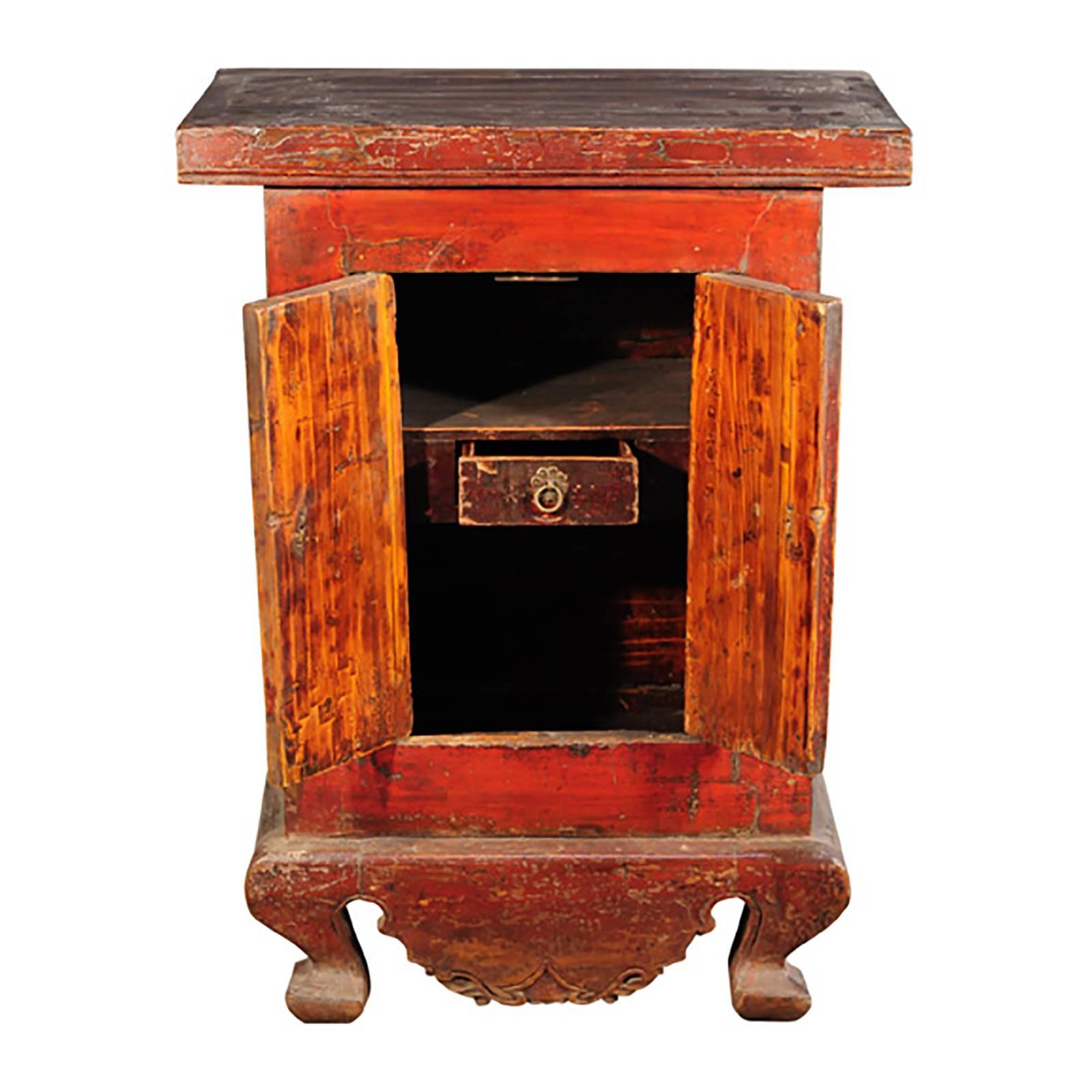 Though rustic through wear, the rich lacquer finish on this petite chest still glows vibrant red. Like many furniture pieces made during the Qing dynasty (1644-1911), the chest, made around 1850, is a charming example of the ways in which artisans
