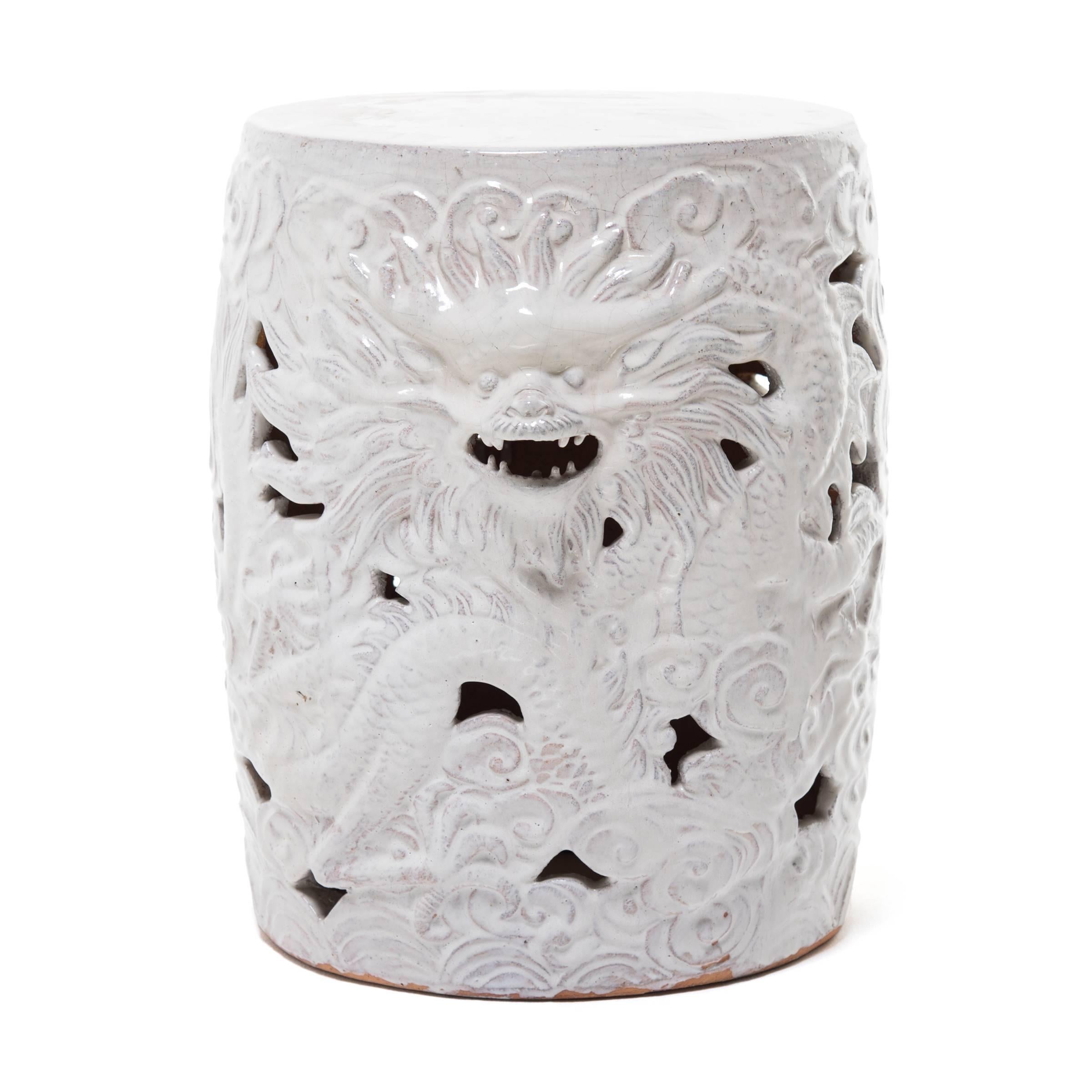 Garden stools were once fixtures in Chinese gardens; they were the perfect place to rest while taking in natural beauty. This one from Jiangxi Province is a stand out contemporary example of an ancient design. The rich sugar white hand applied glaze