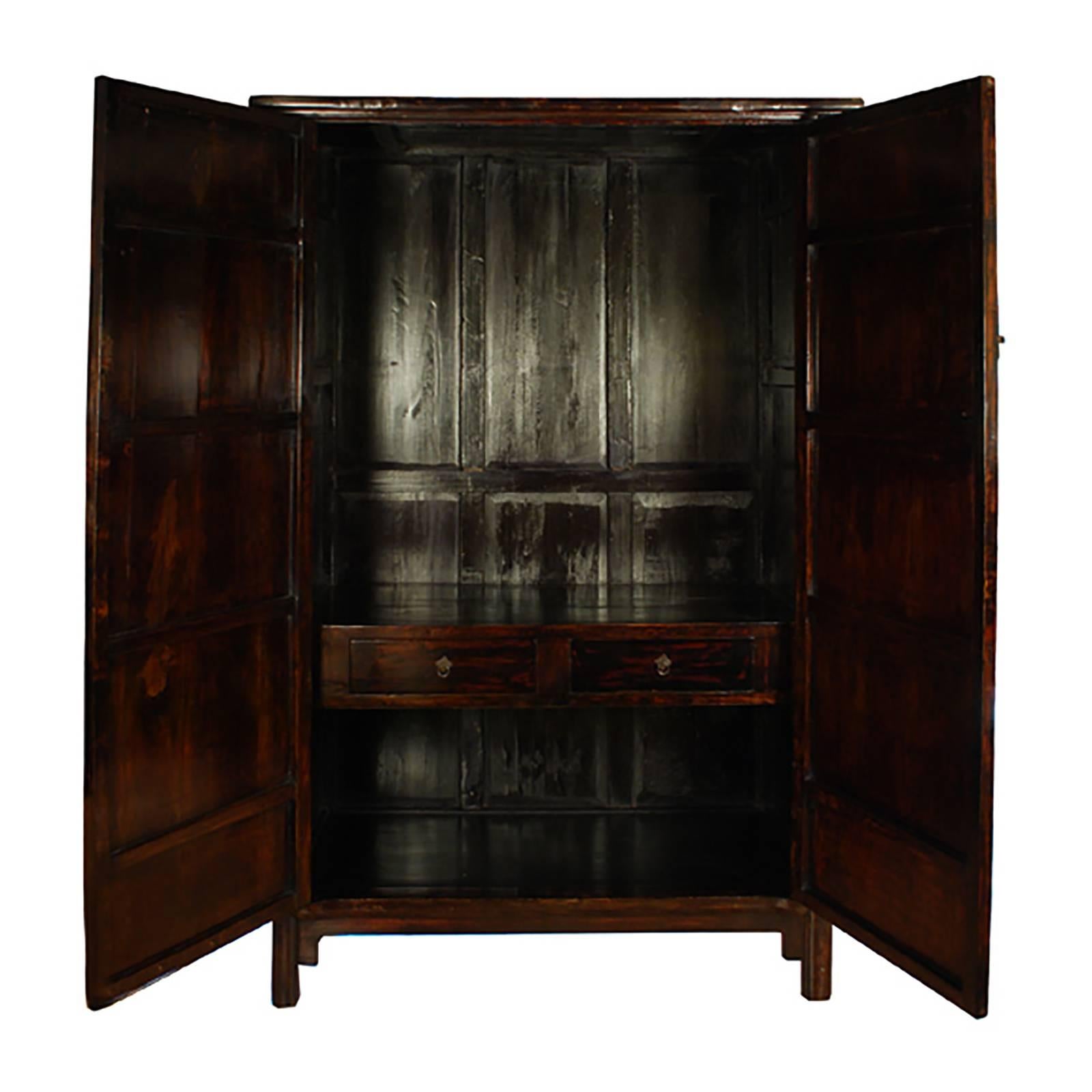This cabinet gets its descriptive name from its rounded moldings, which resemble Chinese noodles. 150 years-old, it is dramatic in its simplicity, with clean lines that sweep upward and impressive door panels that extend without interruption from