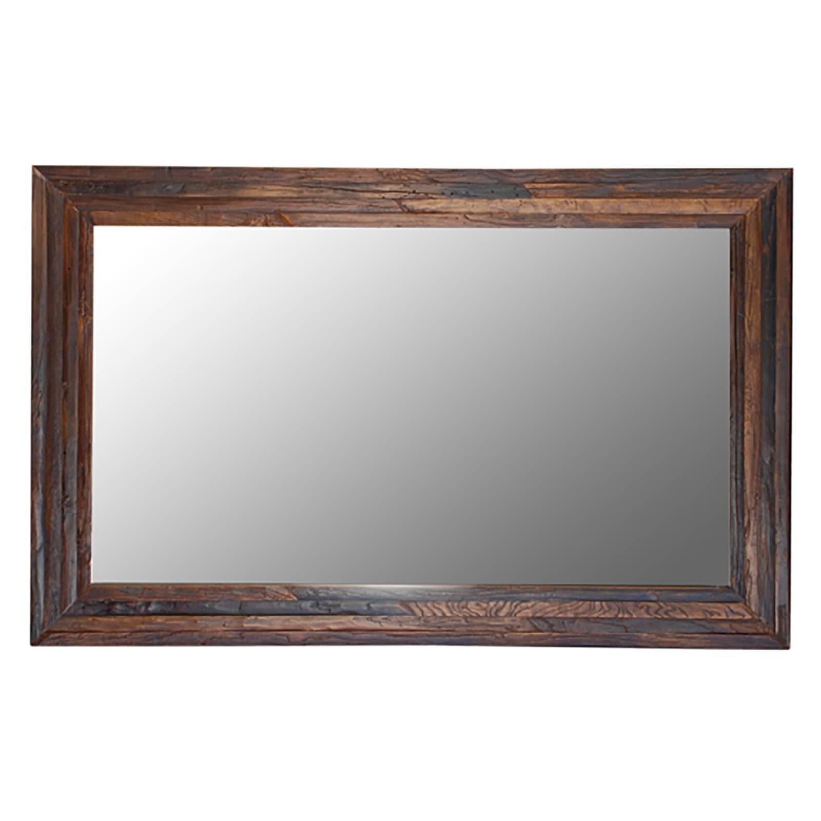 Paying homage to 19th century framed signs of honor presented to respected locals, the frame of this mirror is of monumental scale. It is handcrafted from thick planks of reclaimed elm from centuries old buildings in China. It bears the patina of