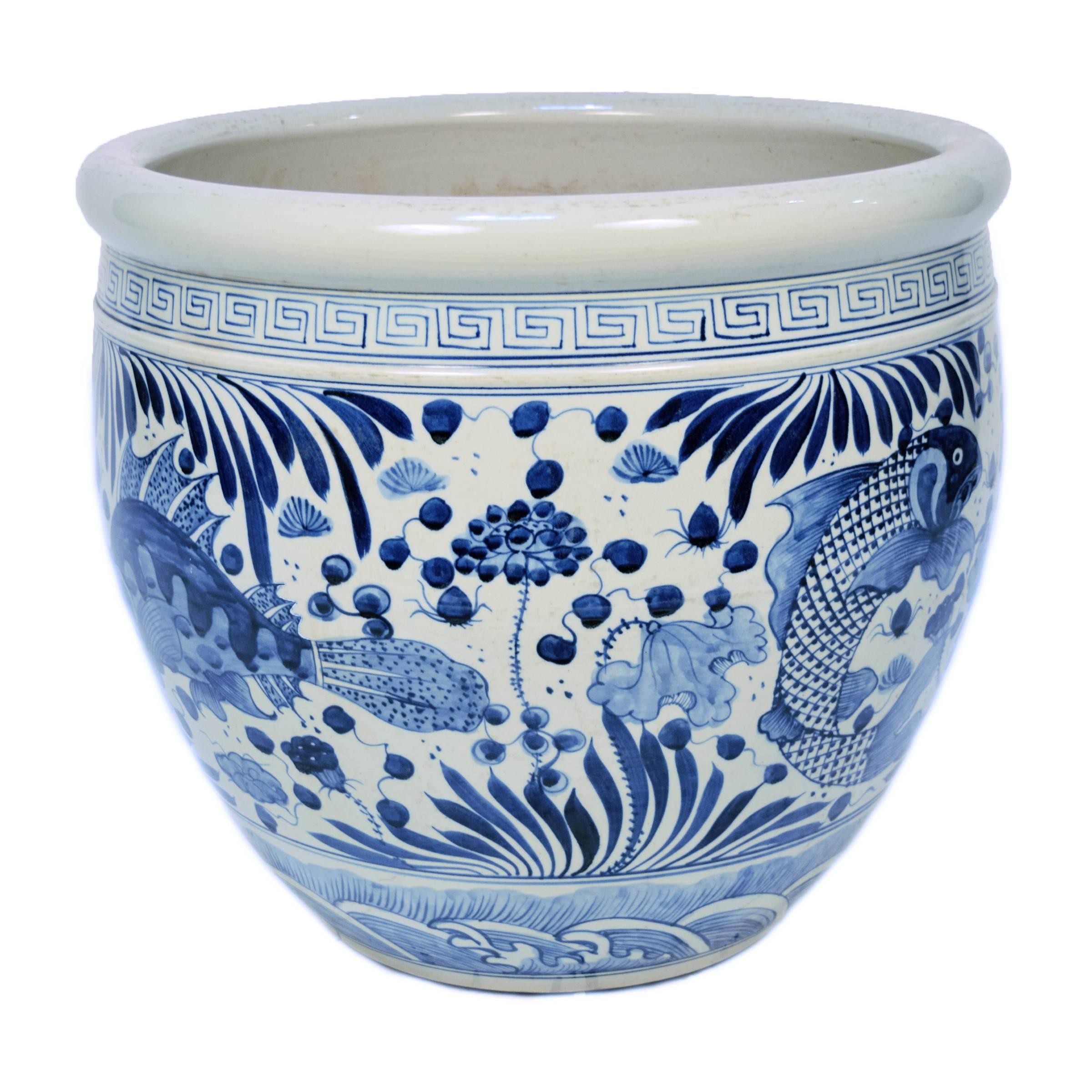 Revered for centuries for its elegant designs and rich cobalt blue and pure white colors, traditional Chinese blue-and-white porcelain lives on in this hand-painted bowl. The painterly fish and flora of the sea are traditional symbols of prosperity