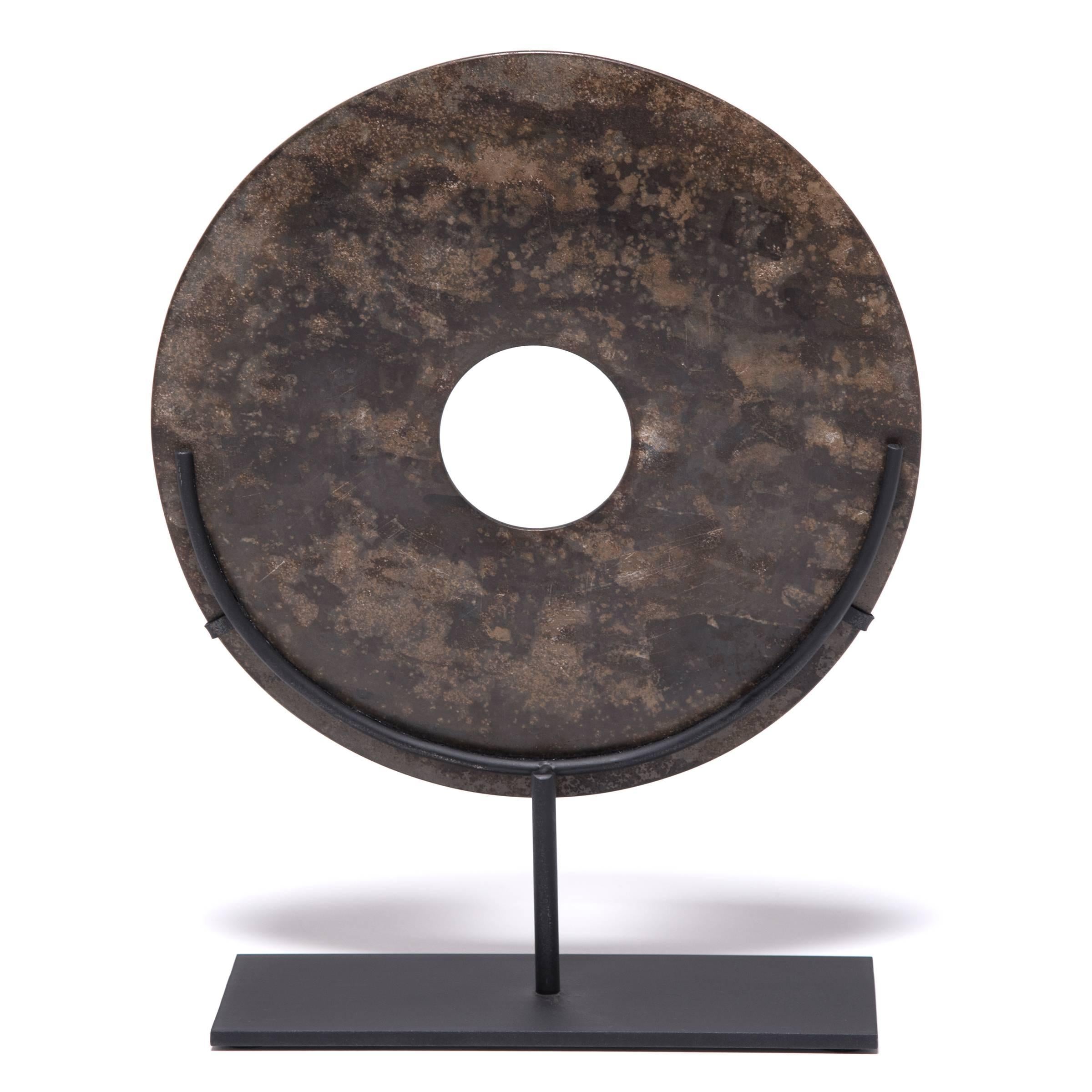 Jades have been cherished for thousands of years, with their rich heritage, beauty, and rarity. Ancient versions of this contemporary jade Bi discs have been found in the tombs of Chinese emperors and aristocrats, but no one knows their true