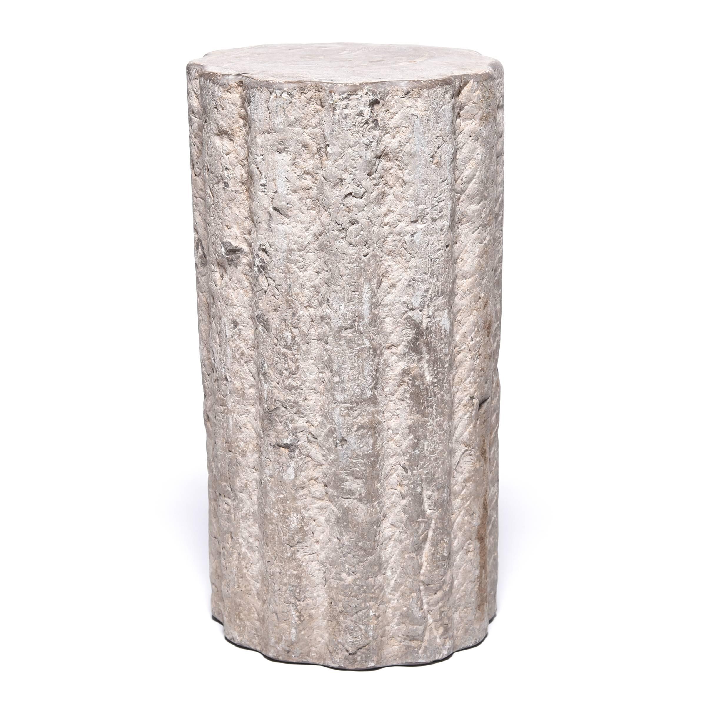 Chinese mill stone with its textured and ribbed surface this hand-carved stone once ground grain and nuts at a Hebei province wind or watermill. Over 100 years old, the stone’s surface has worn down through use, leaving only a hint of its original