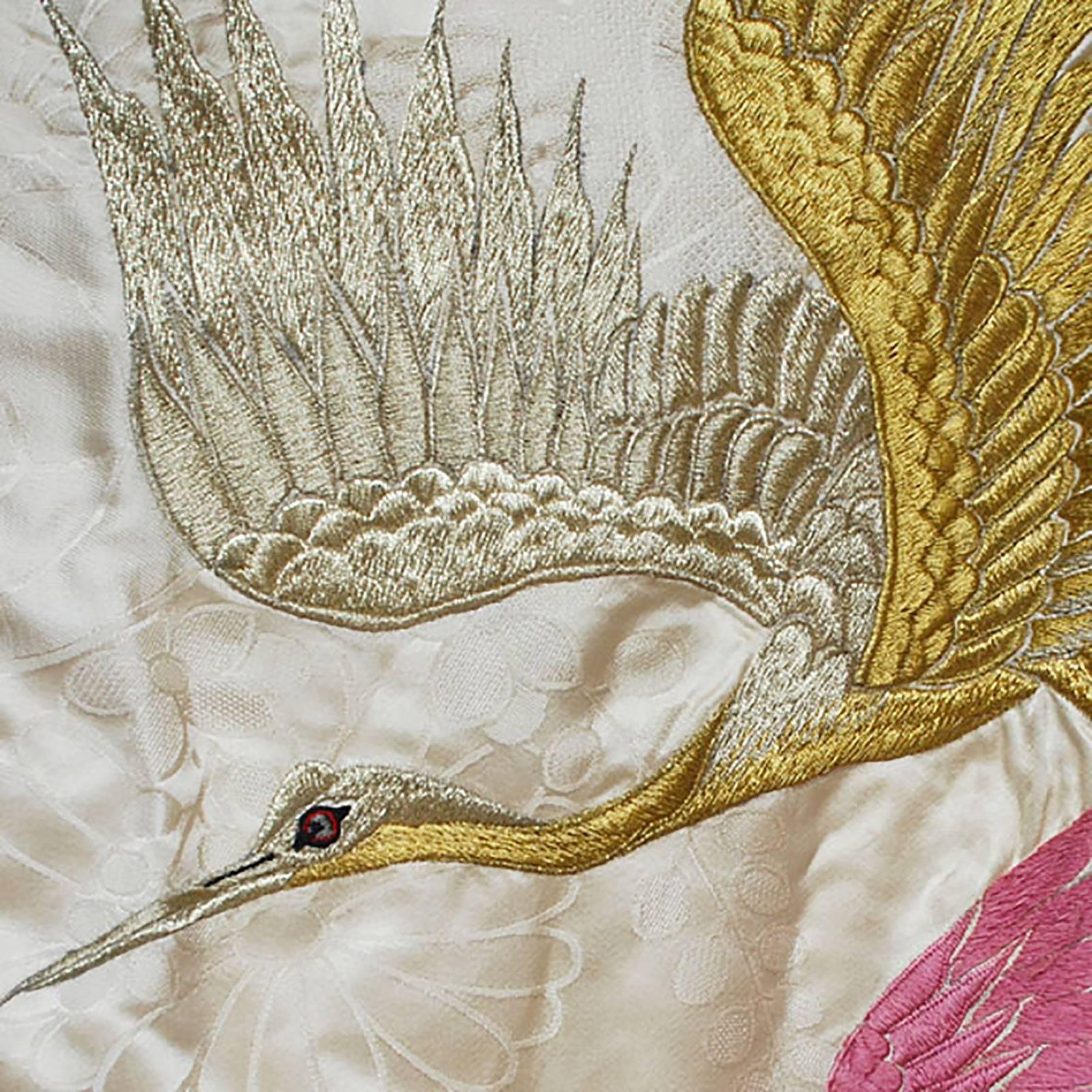 A rare find, this embroidered wedding robe (called a uchikake) was worn by a Japanese bride over 80 years ago, and is a testament to hours of patience and work. With each careful stitch, the beautifully vibrant plum and lime colored cranes become a