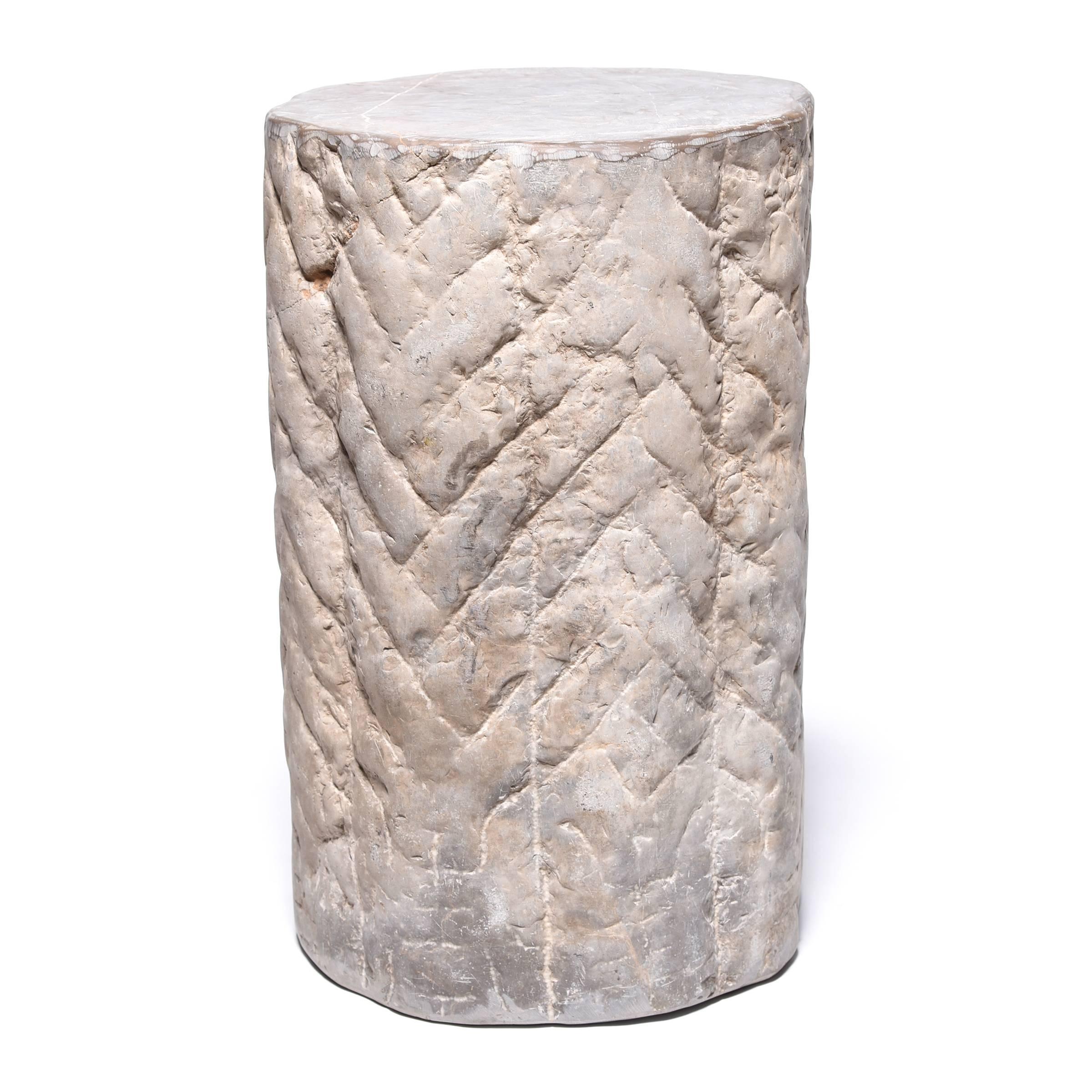 With its textured and ribbed surface this hand-carved stone once ground grain and nuts at a Hebei province wind or watermill. Over a hundred years old, the stone’s surface has worn down through use, leaving only a hint of its original texture. A