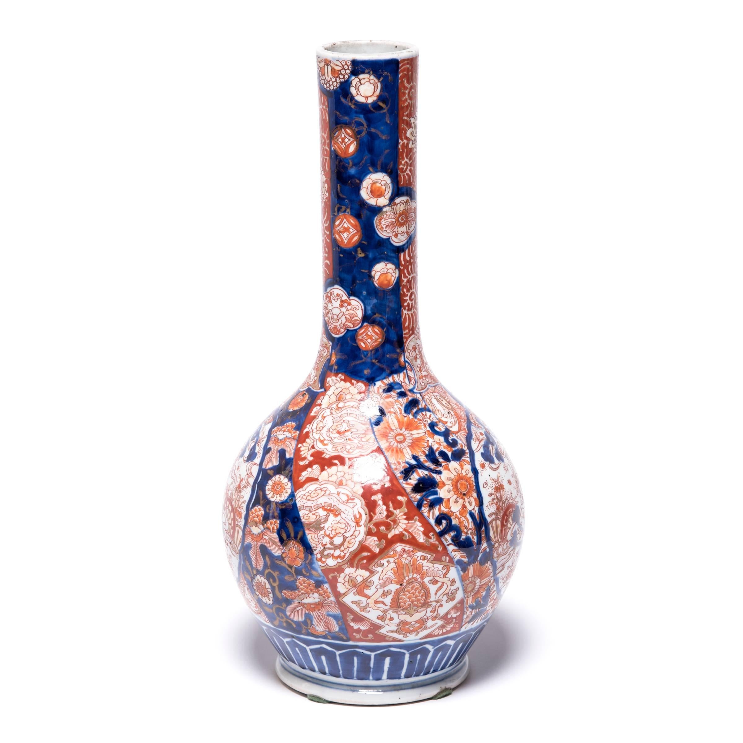 The Meiji period (1868–1912) in Japan saw a revival of many traditional art forms, including the Imari Porcelain style demonstrated by this exquisite pair of bottleneck vases. Named after the Japanese port from which these ceramics were shipped to