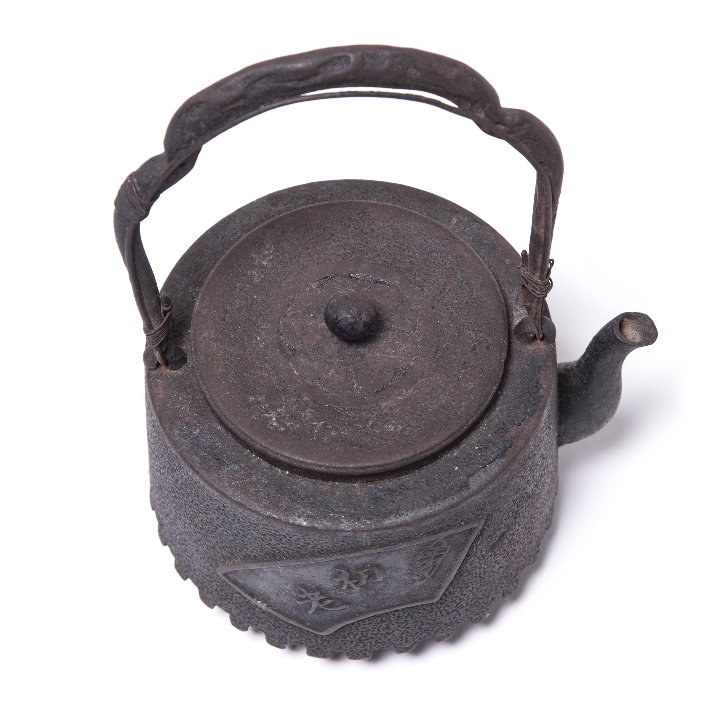 Iron “Fanning the Fire” Japanese Teapot