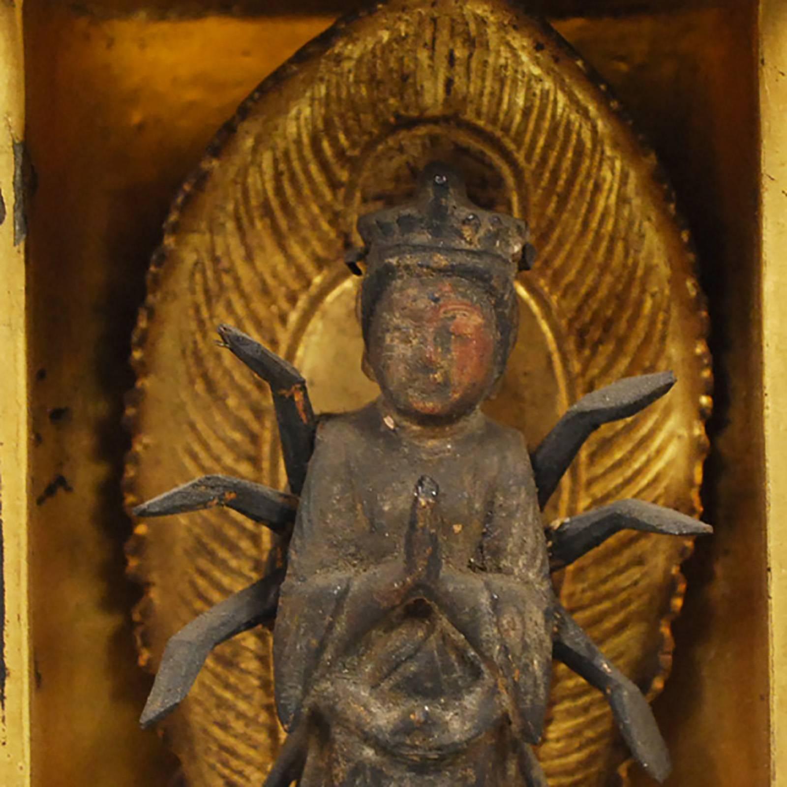 The relatively simple exterior of this shrine belies the splendour within. The doors open to a gilded interior and the figure of a resplendent bodhisattva. Made in the 19th century, this Japanese shrine was likely acquired by a Buddhist follower on