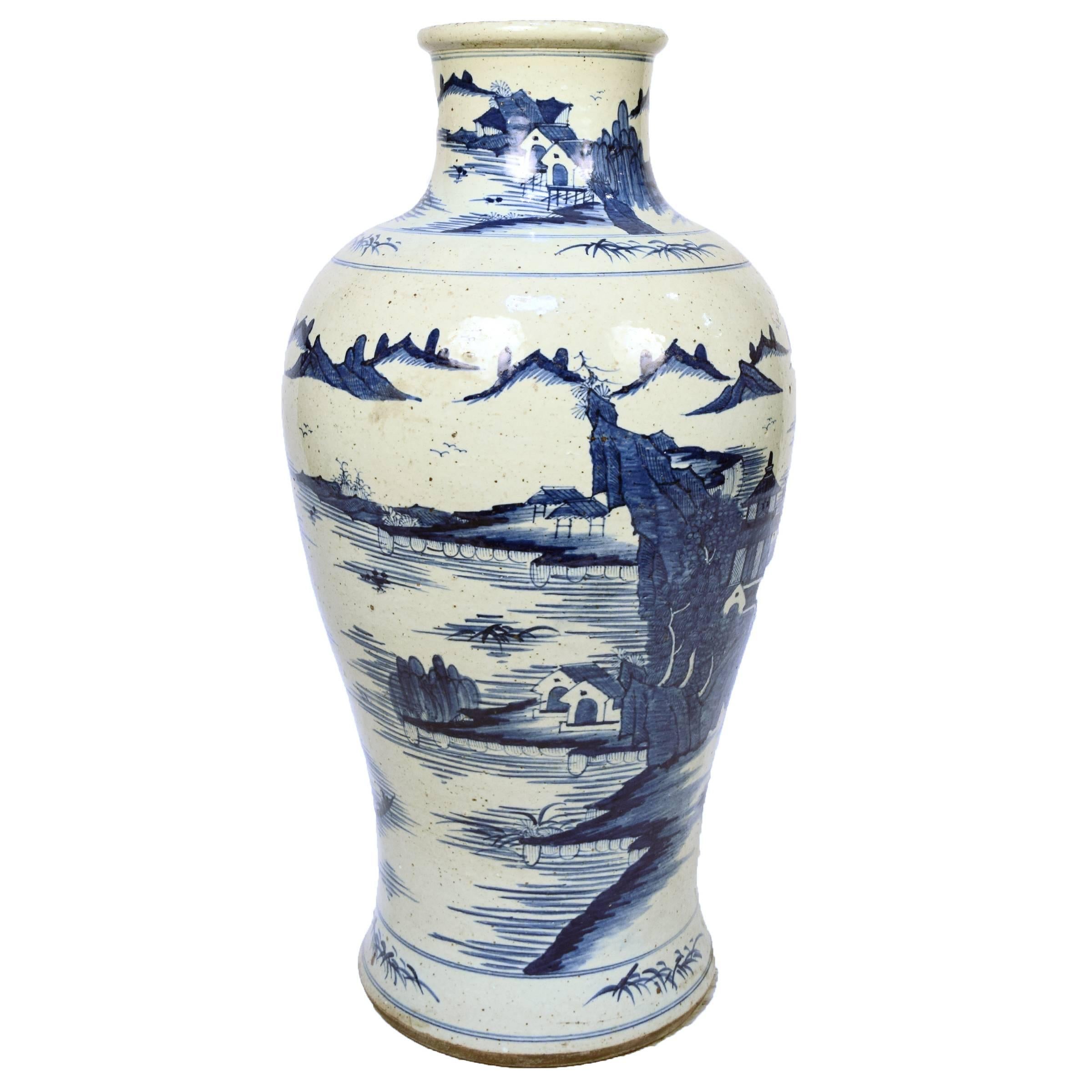 Introduced to Europe in the 14th century, Chinese blue-and-white porcelains were highly sought after as luxury items and are still avidly collected by connoisseurs today. This bottle-shaped vase from Jiangxi province is decorated with a landscape