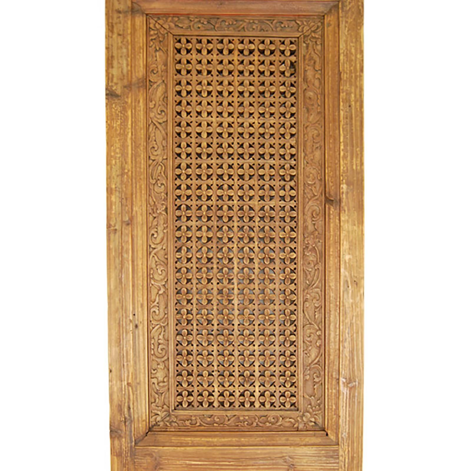 This pair of 19th century Chinese doors evokes life in an aristocratic Chinese courtyard home. Creating this tight floral lattice pattern was like putting a puzzle together; very different from making fretwork by carving or perforating a solid